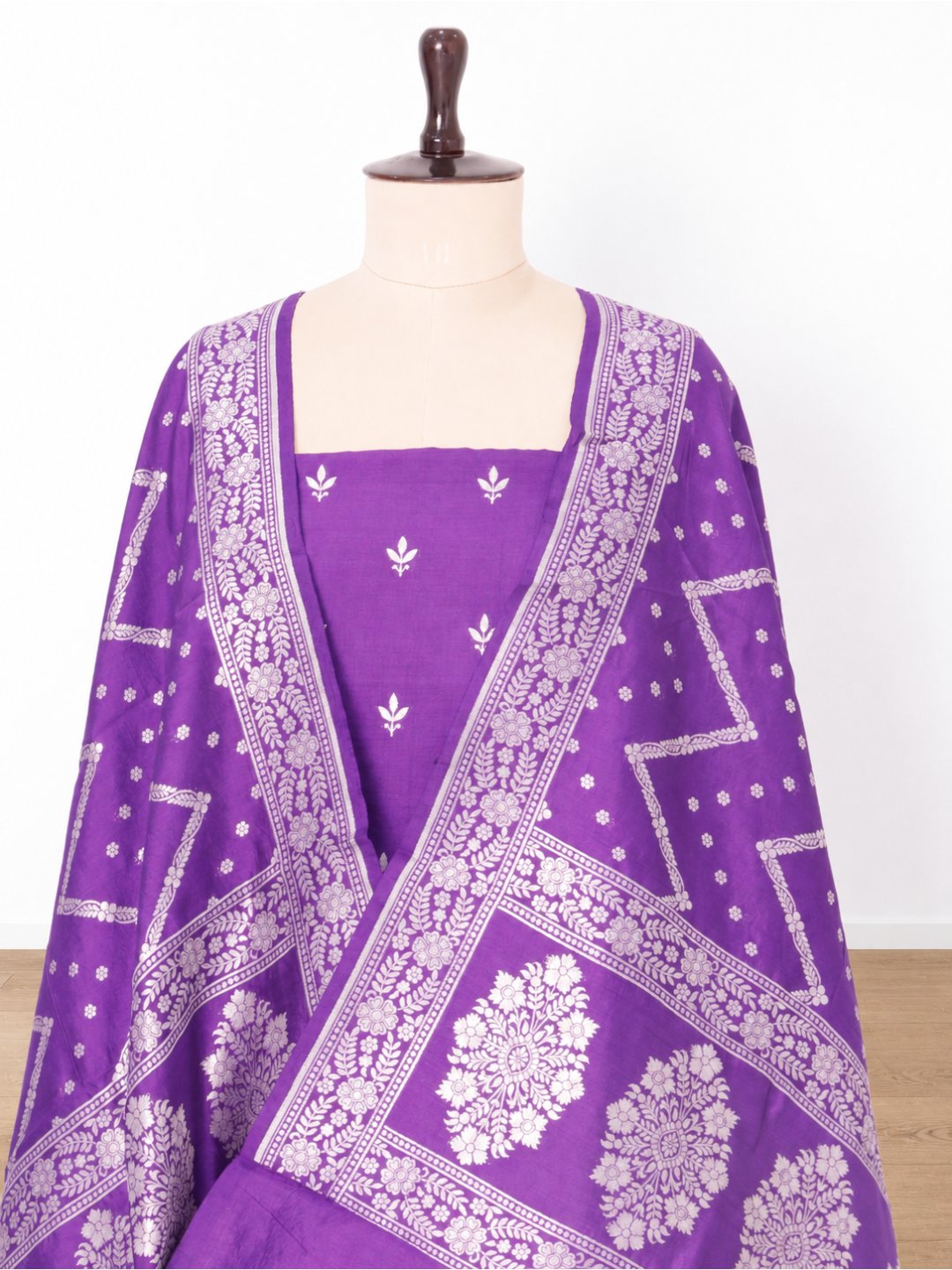 Violet-purple with silver-toned zari detailing. Moonga Silk Banarasi suit front drape view