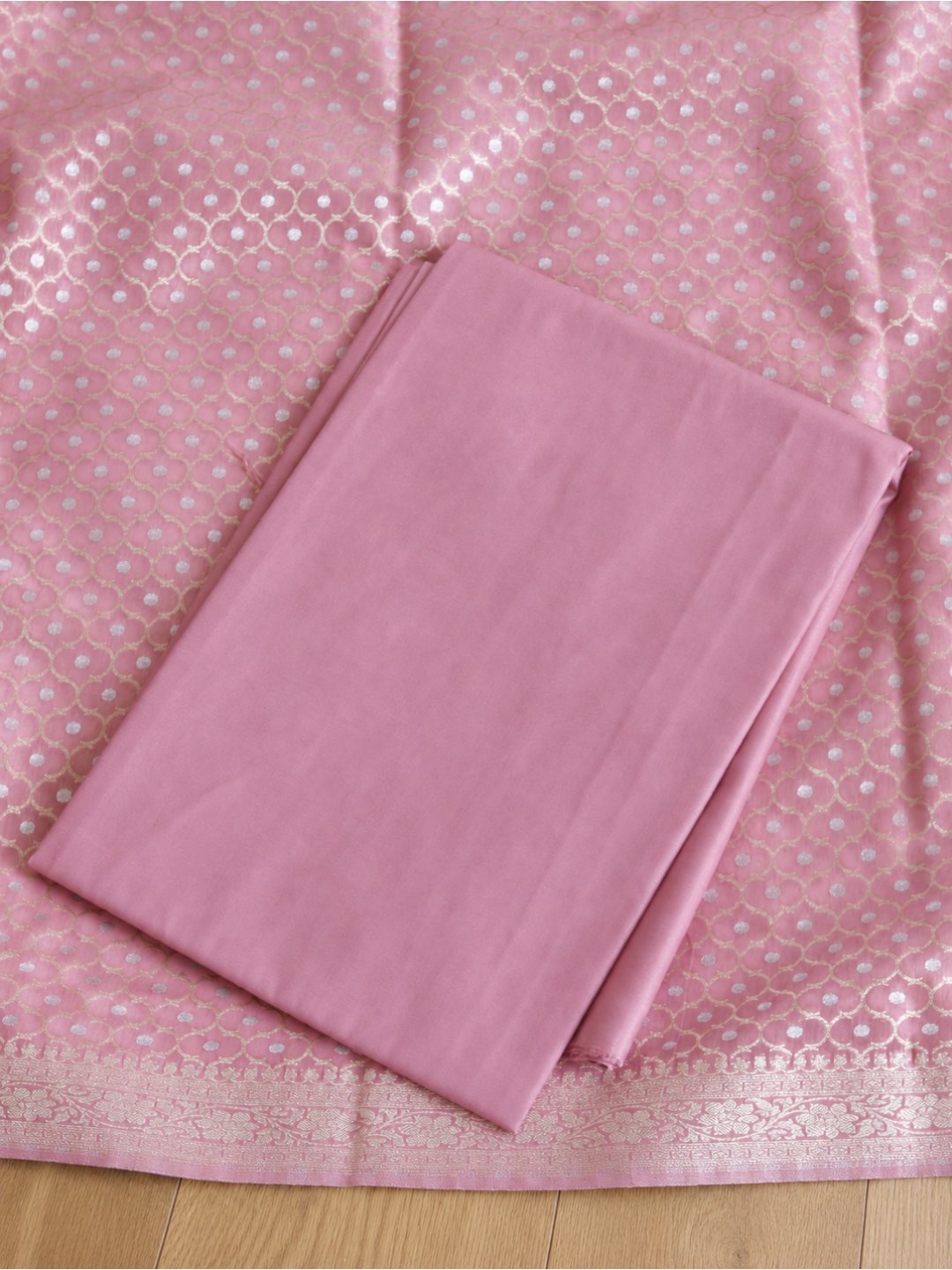 Colour: Muted rose pink with gold and silver-toned zari Chiniya Silk Banarasi suit border closeup