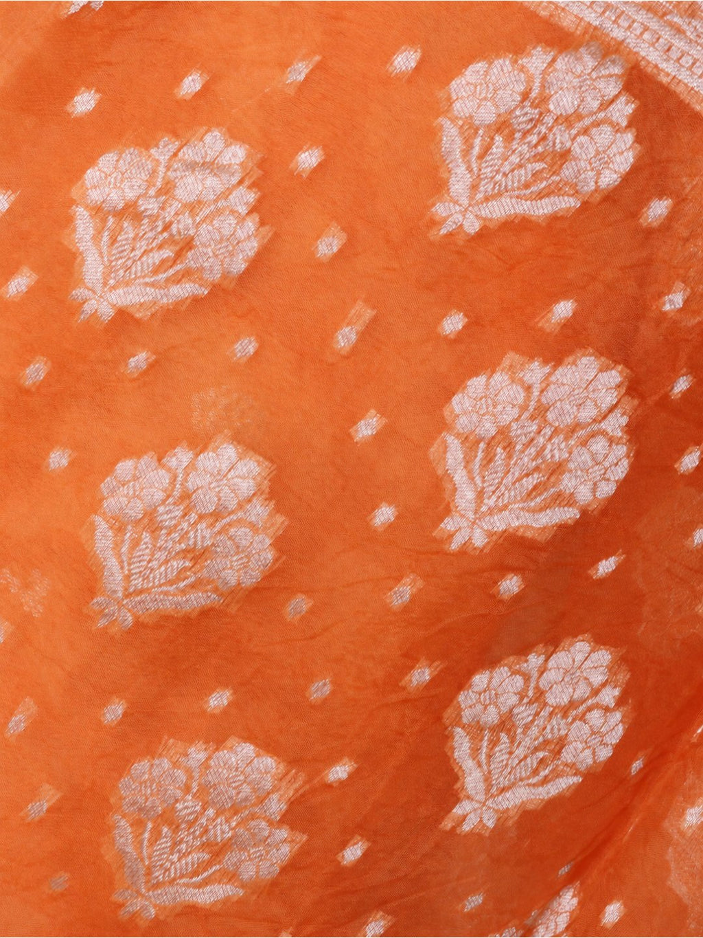 Warm orange with light gold-toned zari work. Chanderi suit Banarasi suit texture detail