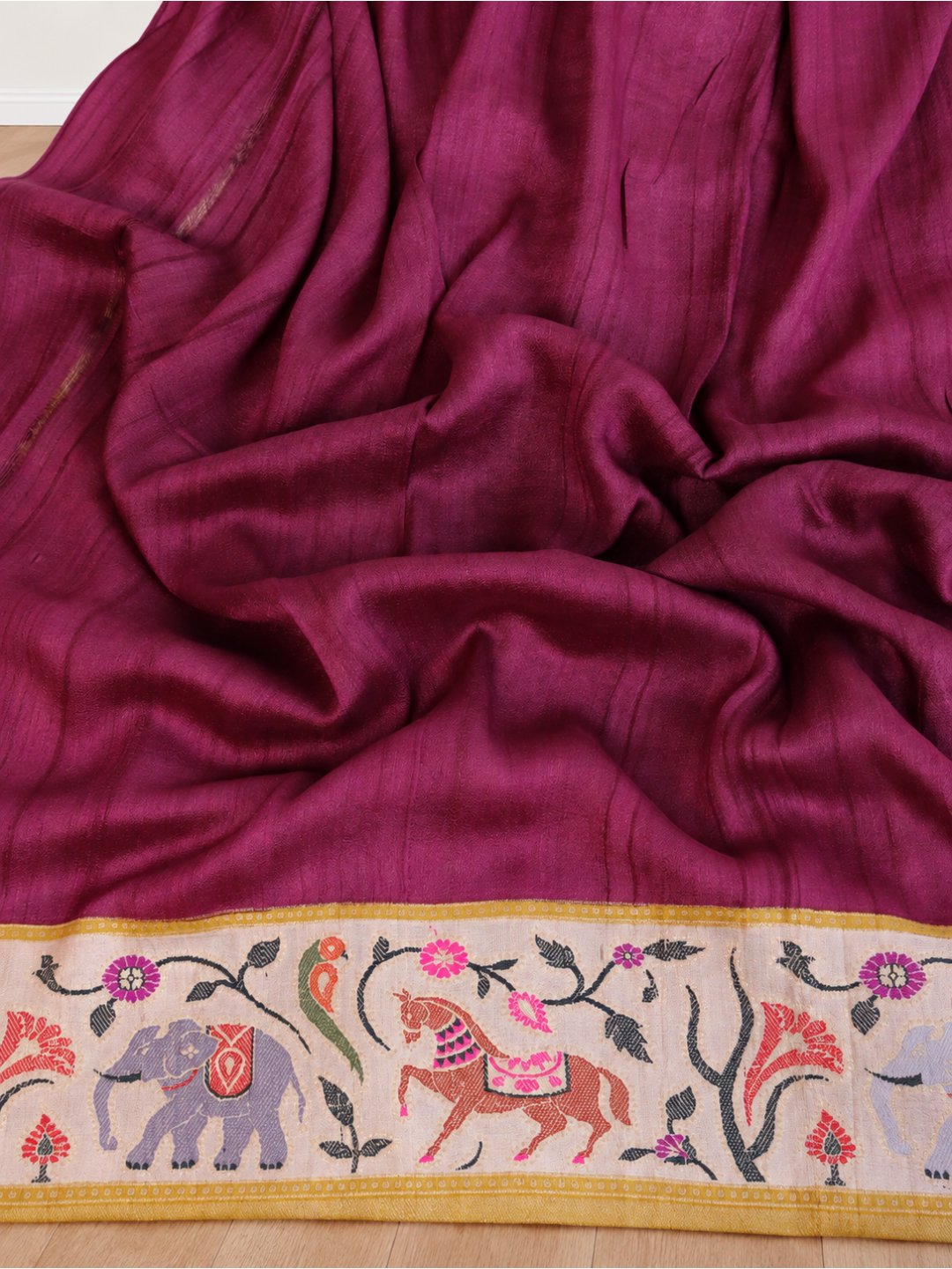 Deep wine body with a cream border, mustard-gold bands and multicoloured detailing Tussar Silk Banarasi saree front drape view