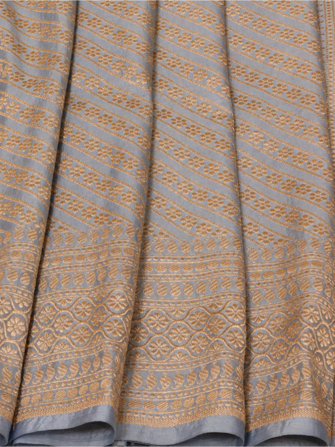 Silvery blue-grey with gold-toned Katan Brocade Saree Banarasi saree border closeup