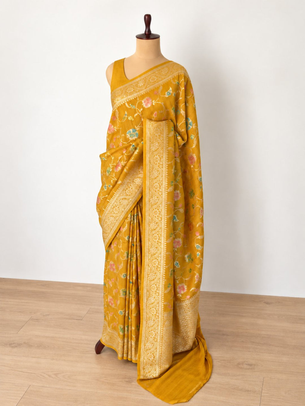 Mustard yellow with gold-toned zari and pastel pink, teal and green detailing Tussar Silk Banarasi saree blouse piece
