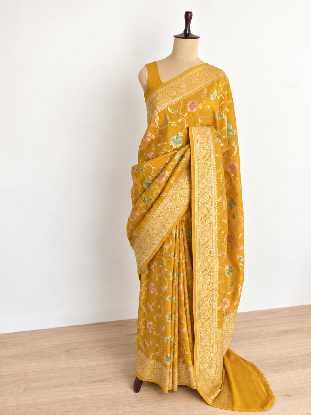 Mustard yellow with gold-toned zari and pastel pink, teal and green detailing Tussar Silk Banarasi saree full spread