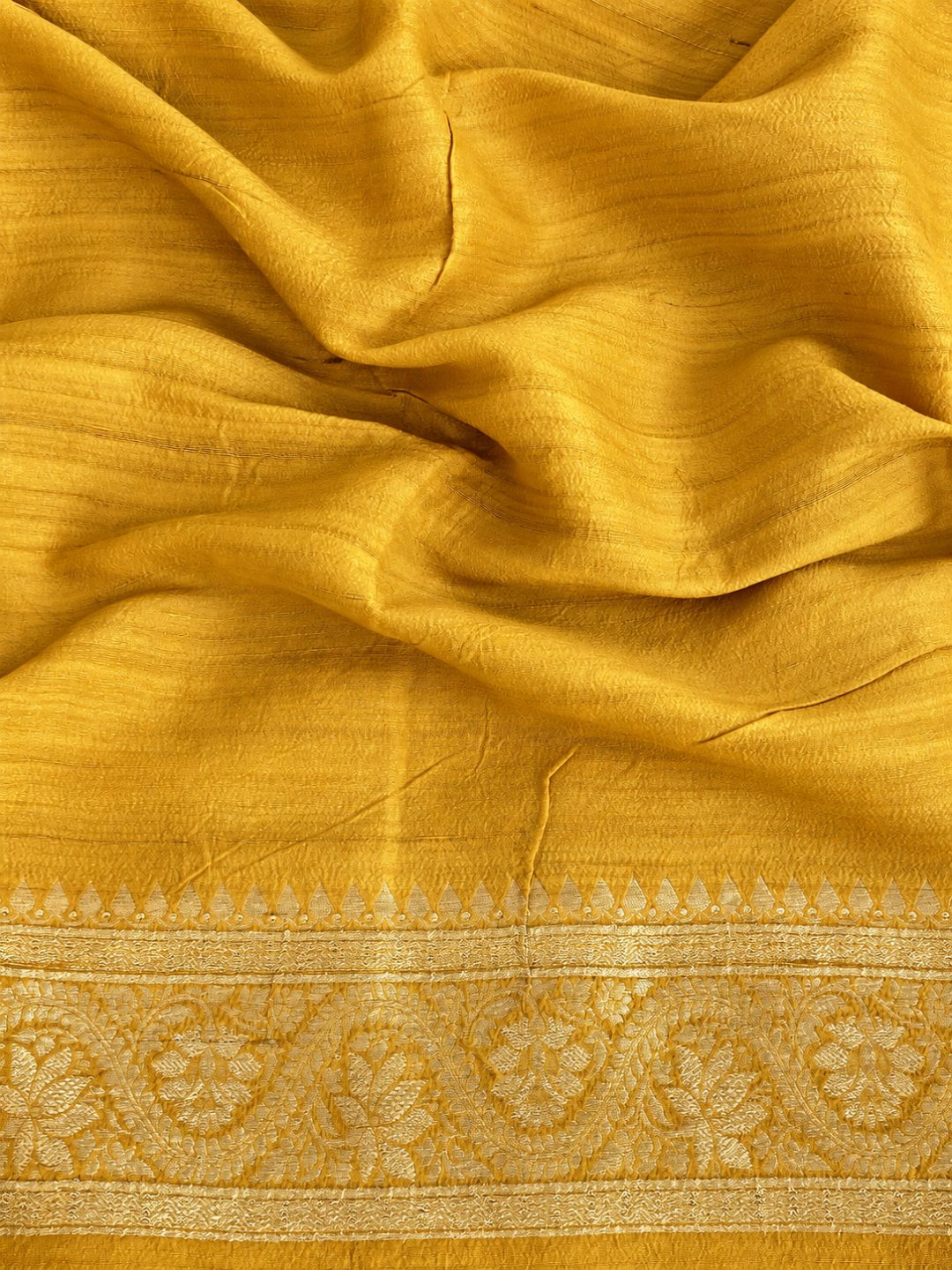 Mustard yellow with gold-toned zari and pastel pink, teal and green detailing Tussar Silk Banarasi saree zari work detail