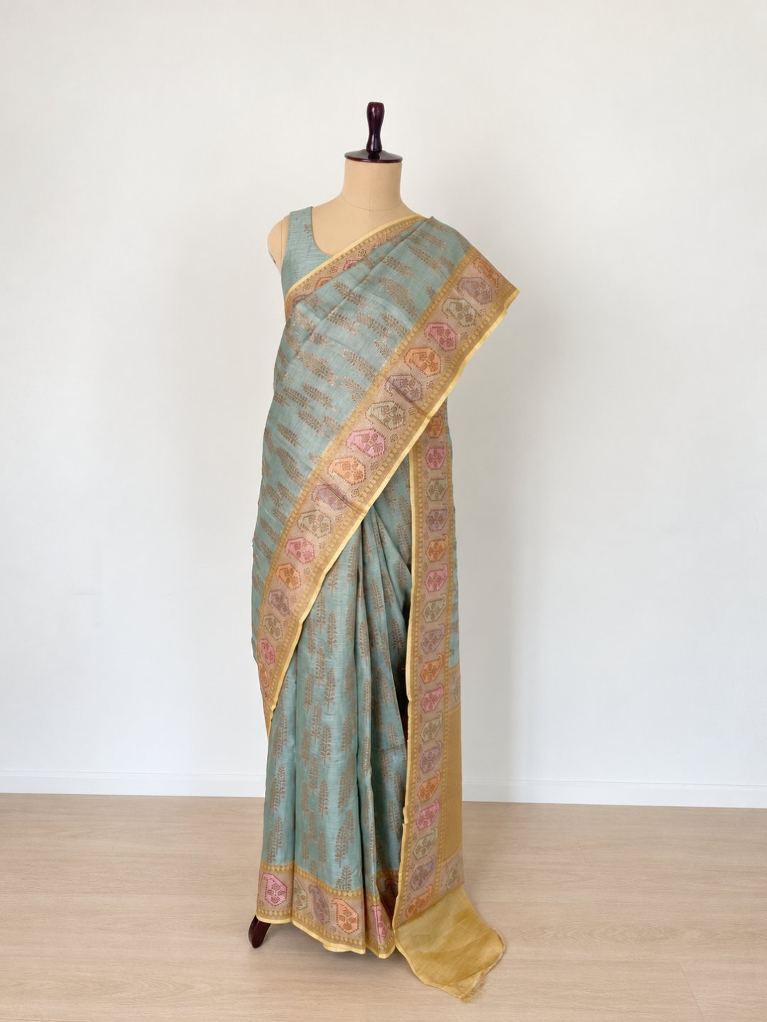 Sea blue with antique gold-toned Tussar Silk Banarasi saree front drape view