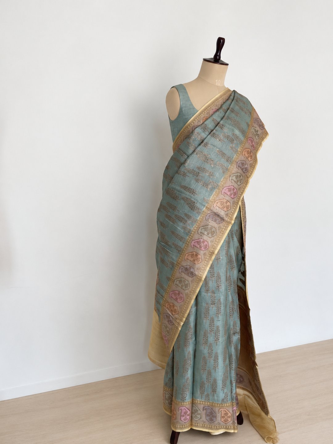 Sea blue with antique gold-toned Tussar Silk Banarasi saree front drape view
