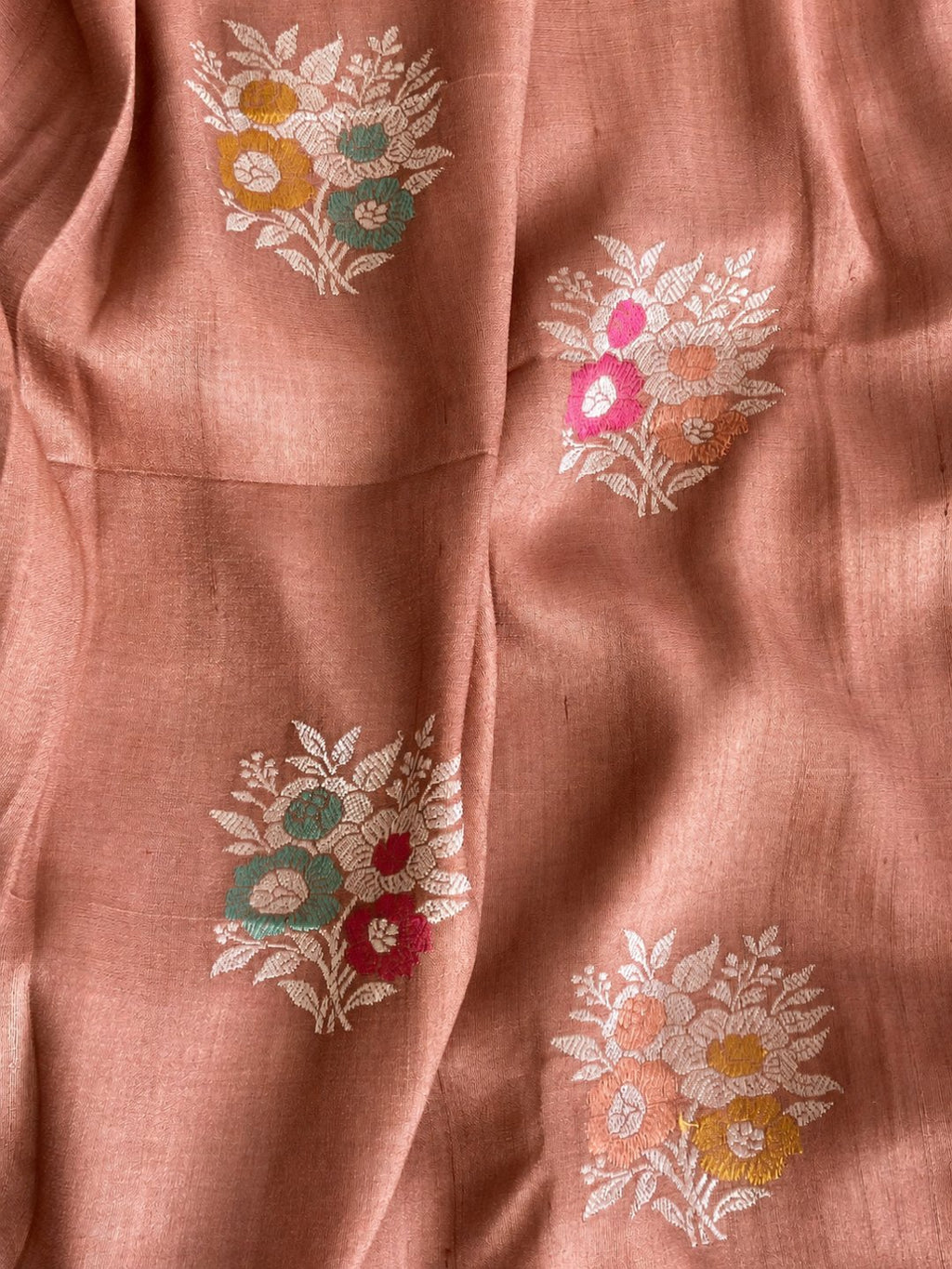 Warm copper-peach with zari detailing Tussar Silk Banarasi saree border closeup