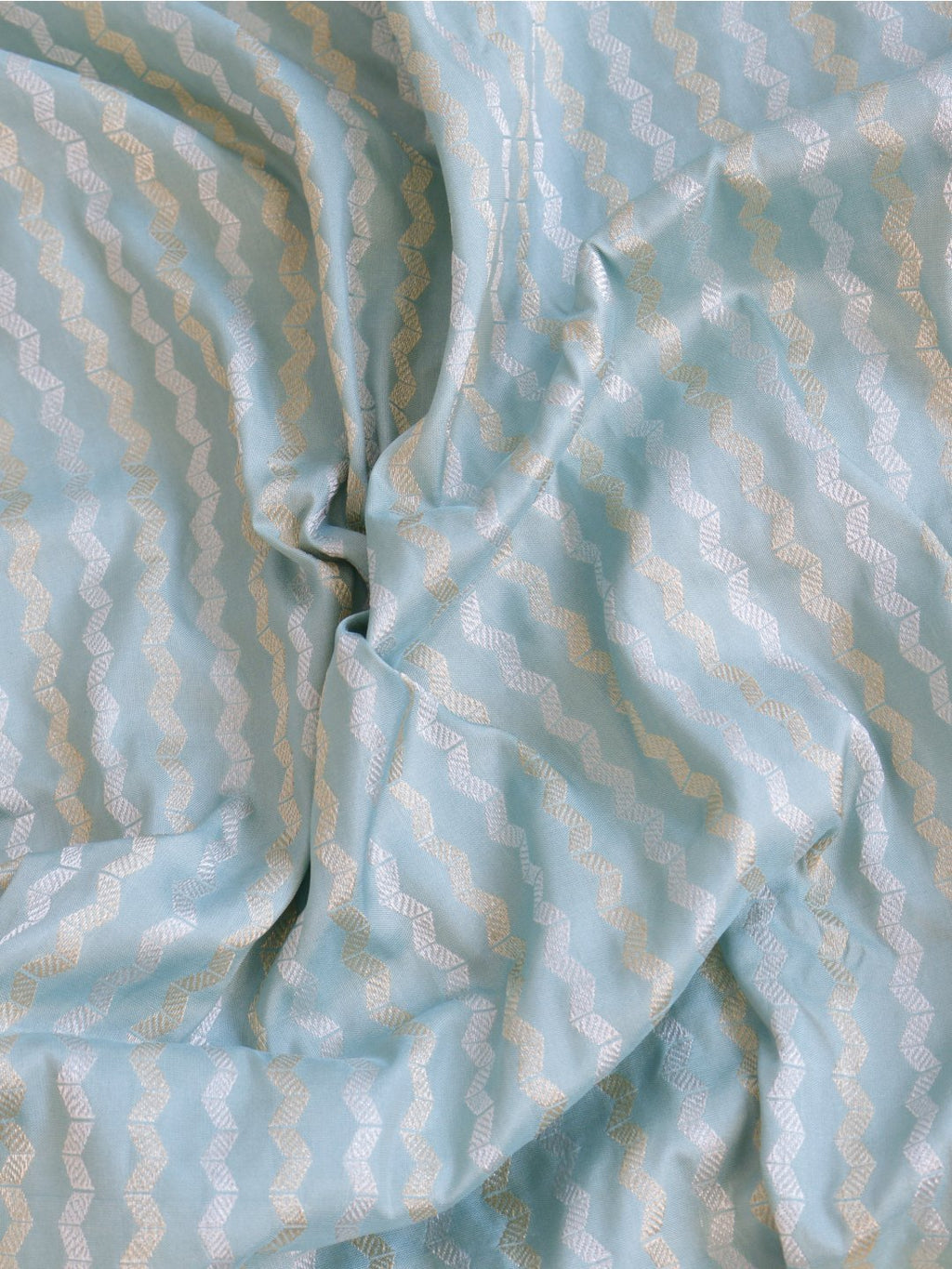 Powder aqua blue with a cream-gold border Katan Silk Banarasi saree zari work detail