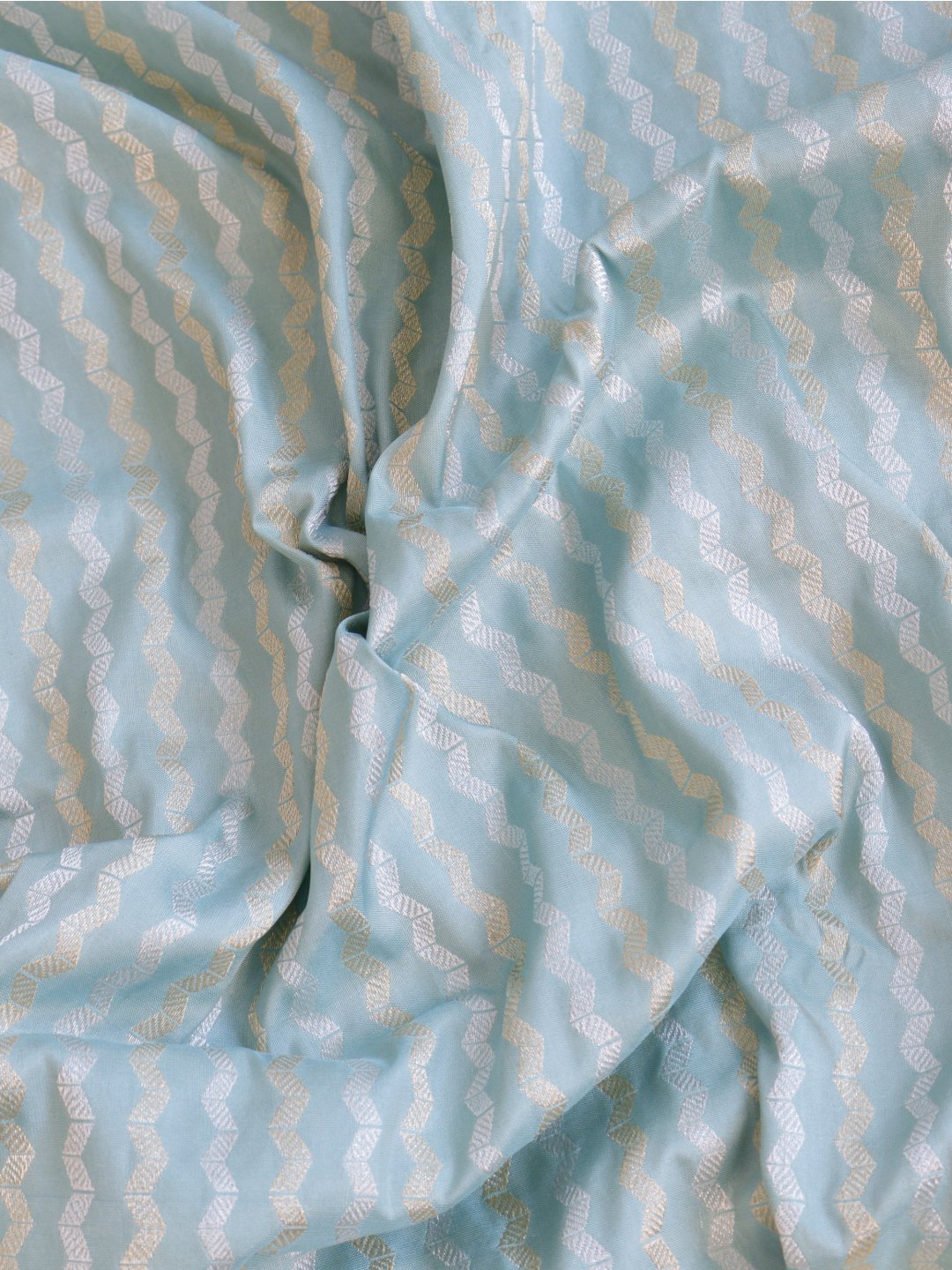 Powder aqua blue with a cream-gold border Katan Silk Banarasi saree zari work detail