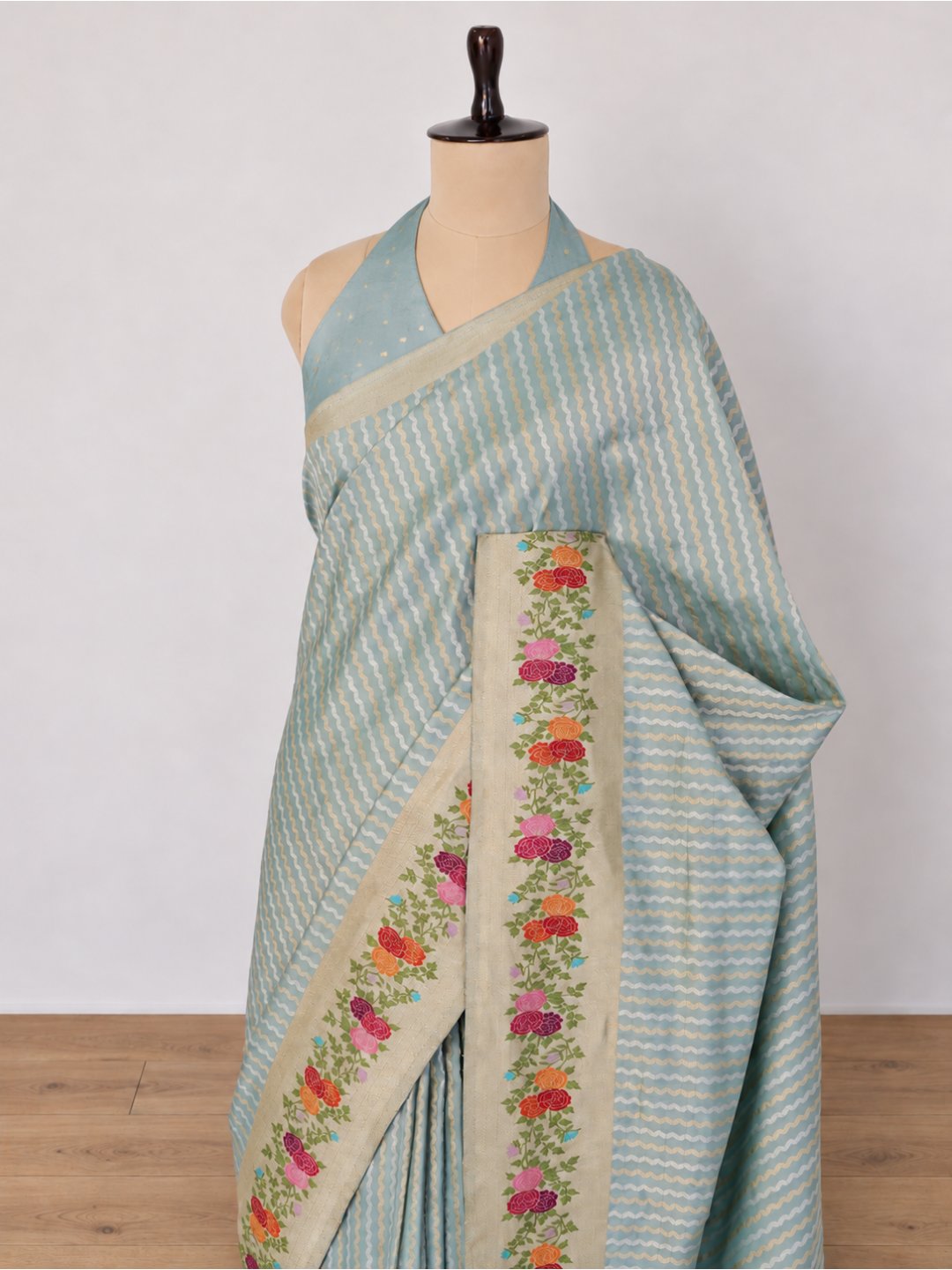 Powder aqua blue with a cream-gold border Katan Silk Banarasi saree pallu detail