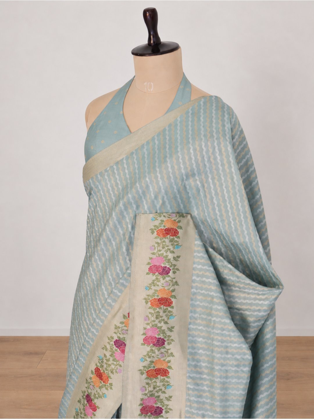 Powder aqua blue with a cream-gold border Katan Silk Banarasi saree front drape view