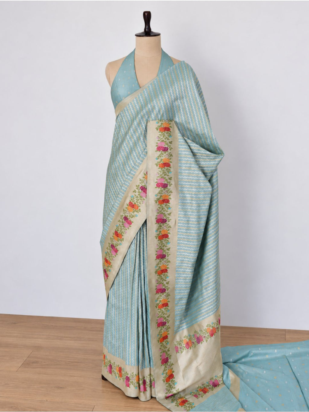 Powder aqua blue with a cream-gold border Katan Silk Banarasi saree texture detail