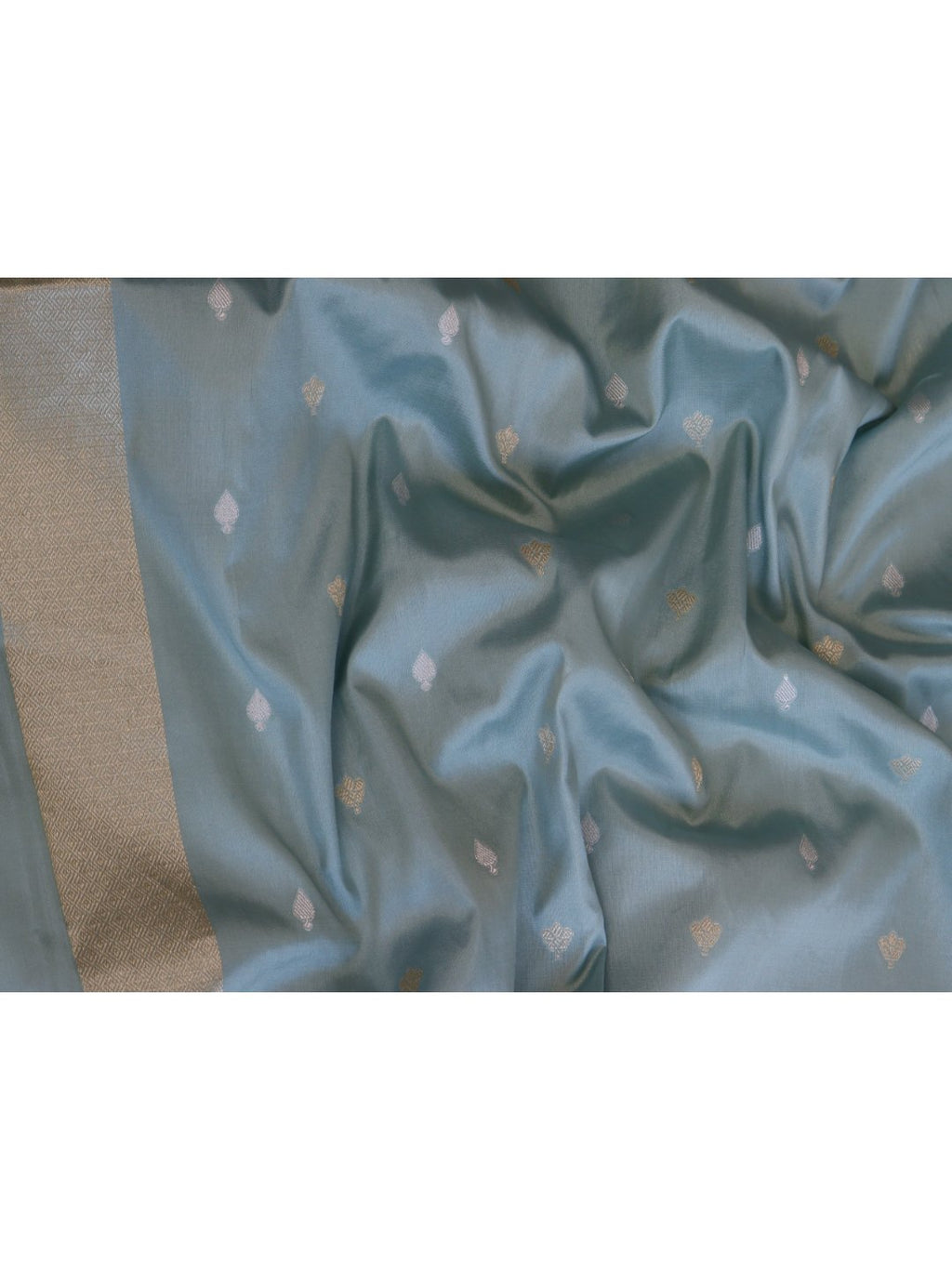 Powder aqua blue with a cream-gold border Katan Silk Banarasi saree pallu detail