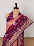 Soft peach-pink body with a rich purple borde Katan Silk Banarasi saree front drape view