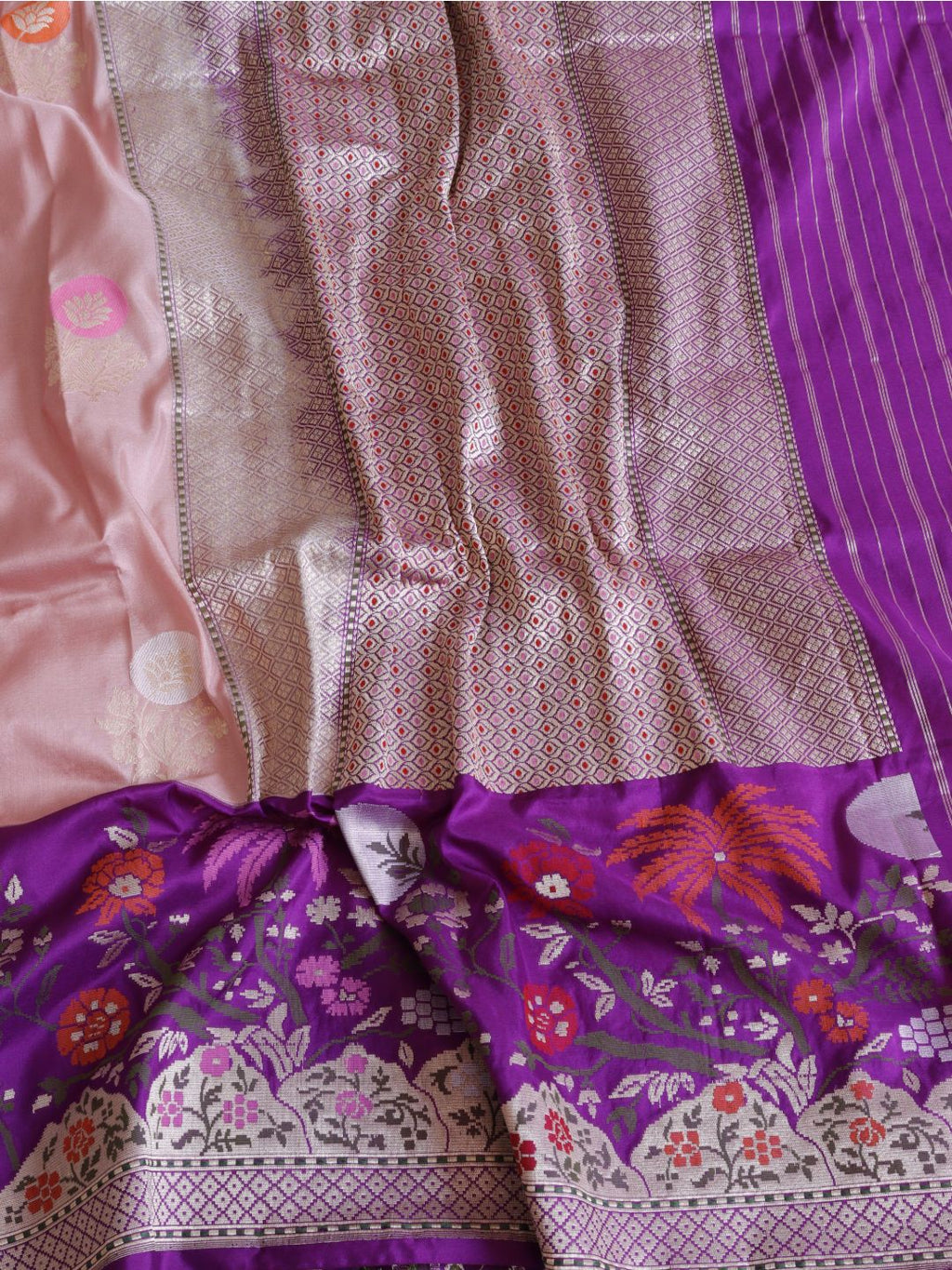 Soft peach-pink body with a rich purple borde Katan Silk Banarasi saree full spread