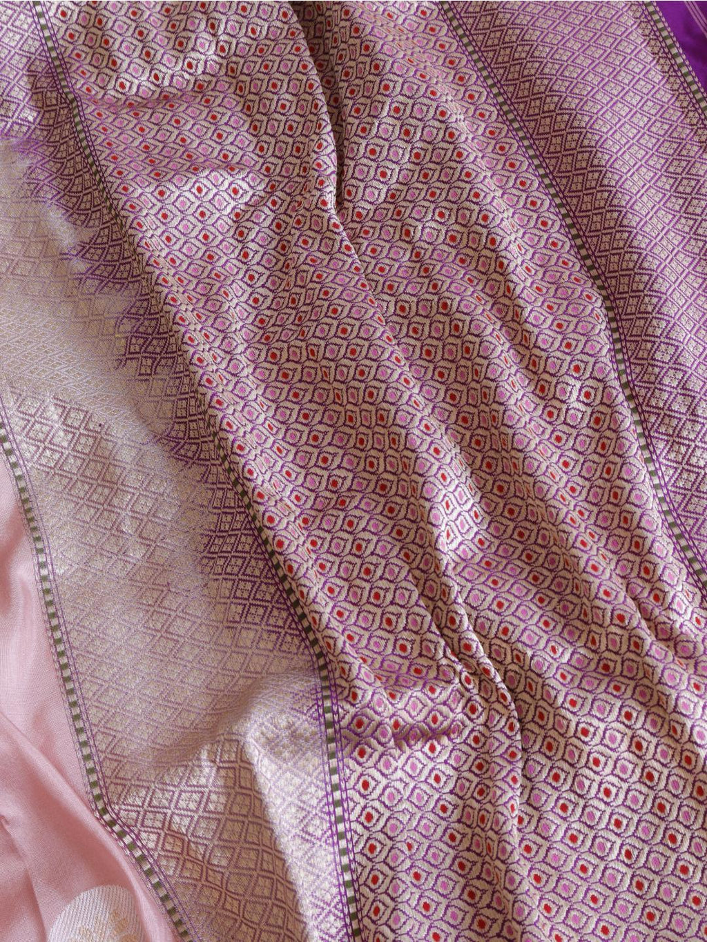 Soft peach-pink body with a rich purple borde Katan Silk Banarasi saree blouse piece