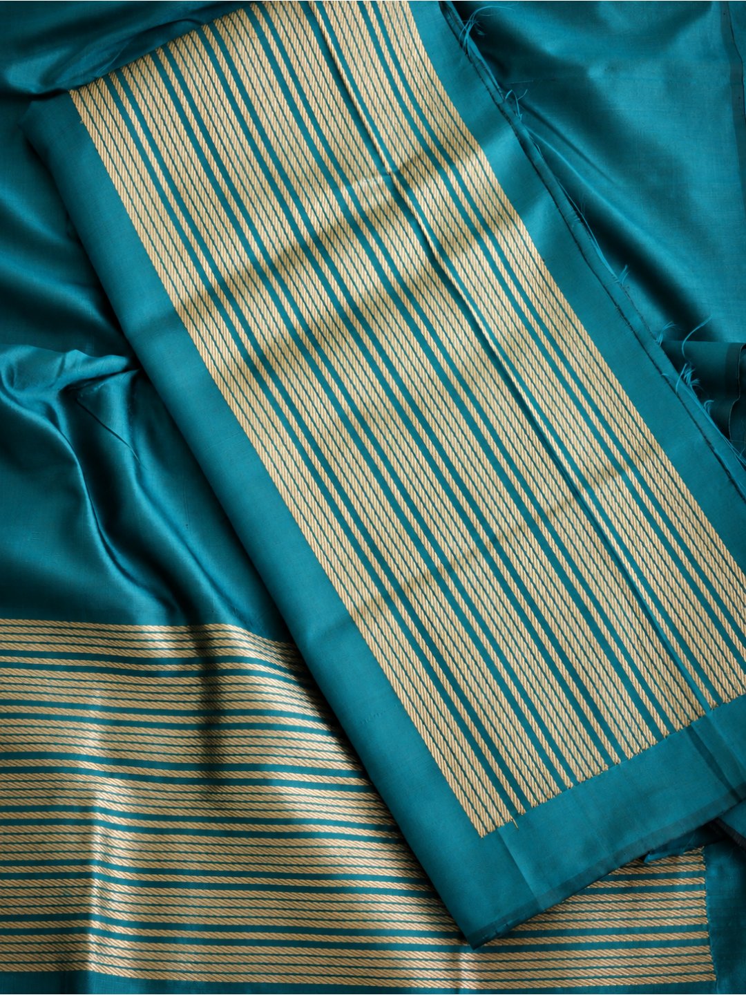 Teal with gold-toned detailing Katan Silk Banarasi suit bottom detail