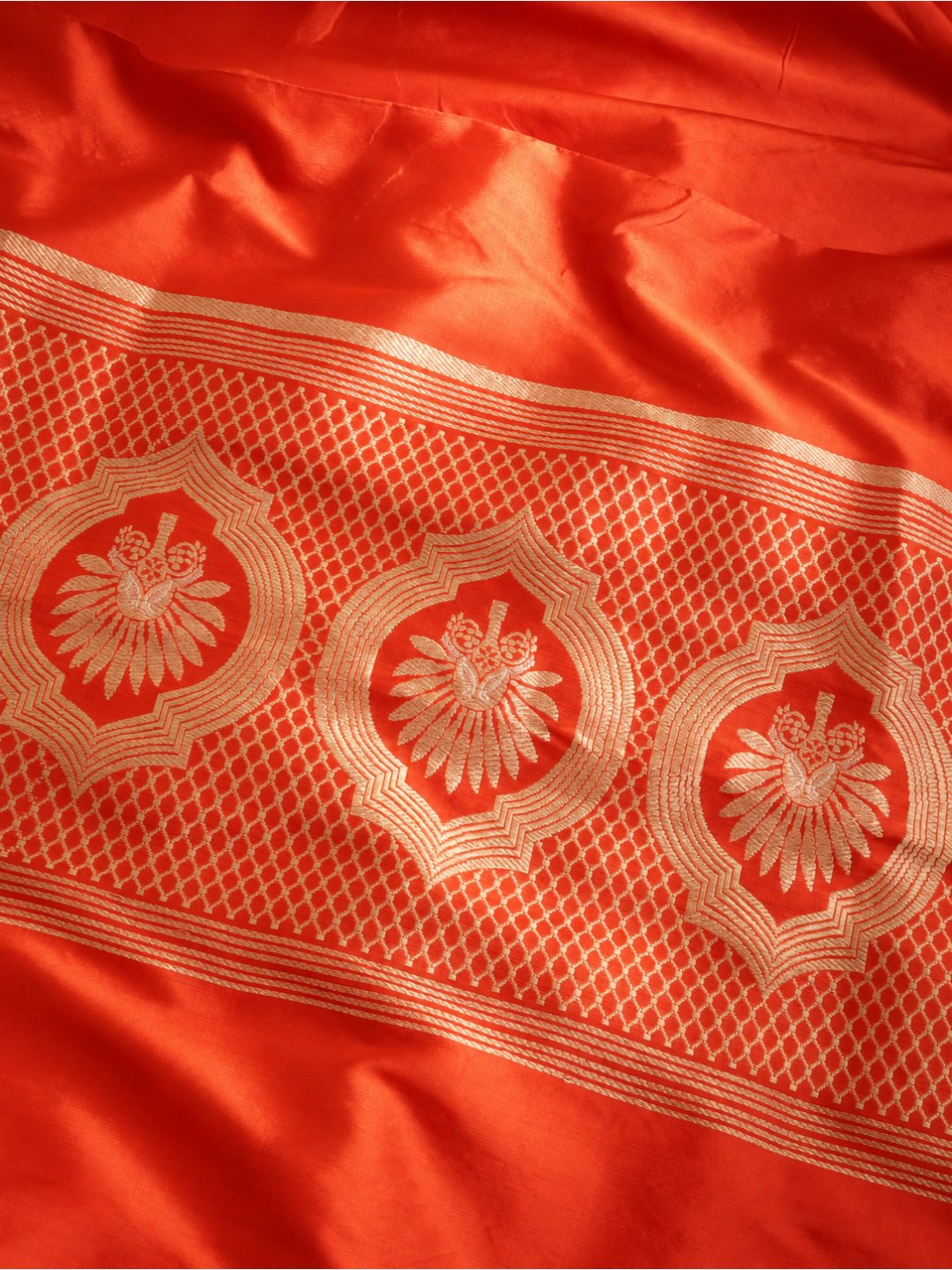 Bright orange with gold detailing Katan Silk Banarasi suit bottom detail