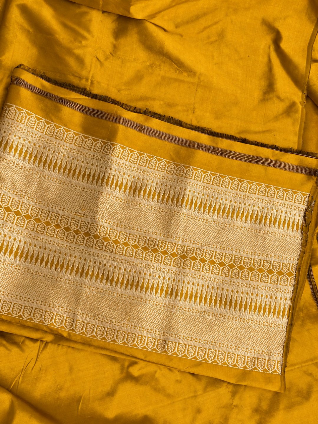 Mustard yellow with gold detailing and small red accents Katan Silk Banarasi suit front drape view