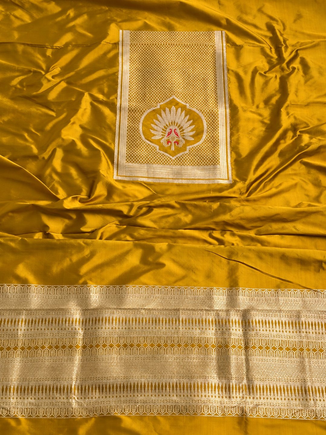 Mustard yellow with gold detailing and small red accents Katan Silk Banarasi suit front drape view