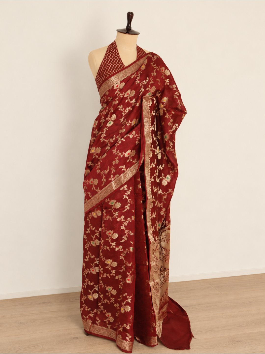 Deep maroon with gold-toned detailing Viscose Banarasi saree pallu detail