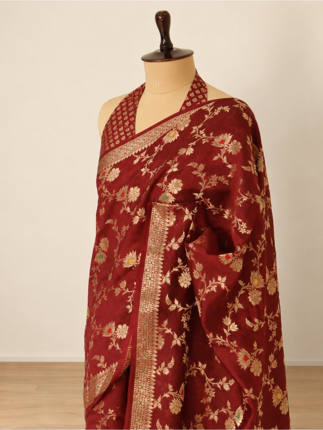 Deep maroon with gold-toned detailing Viscose Banarasi saree texture detail