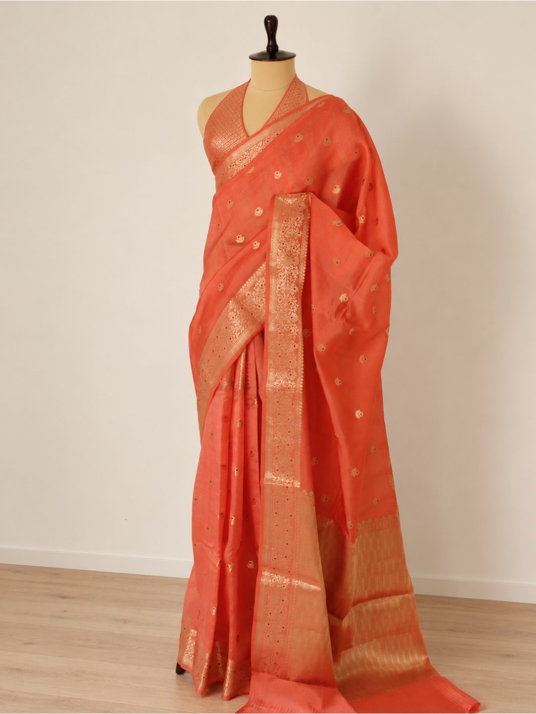Coral orange with gold-toned detailing Viscose Saree Banarasi saree pallu detail