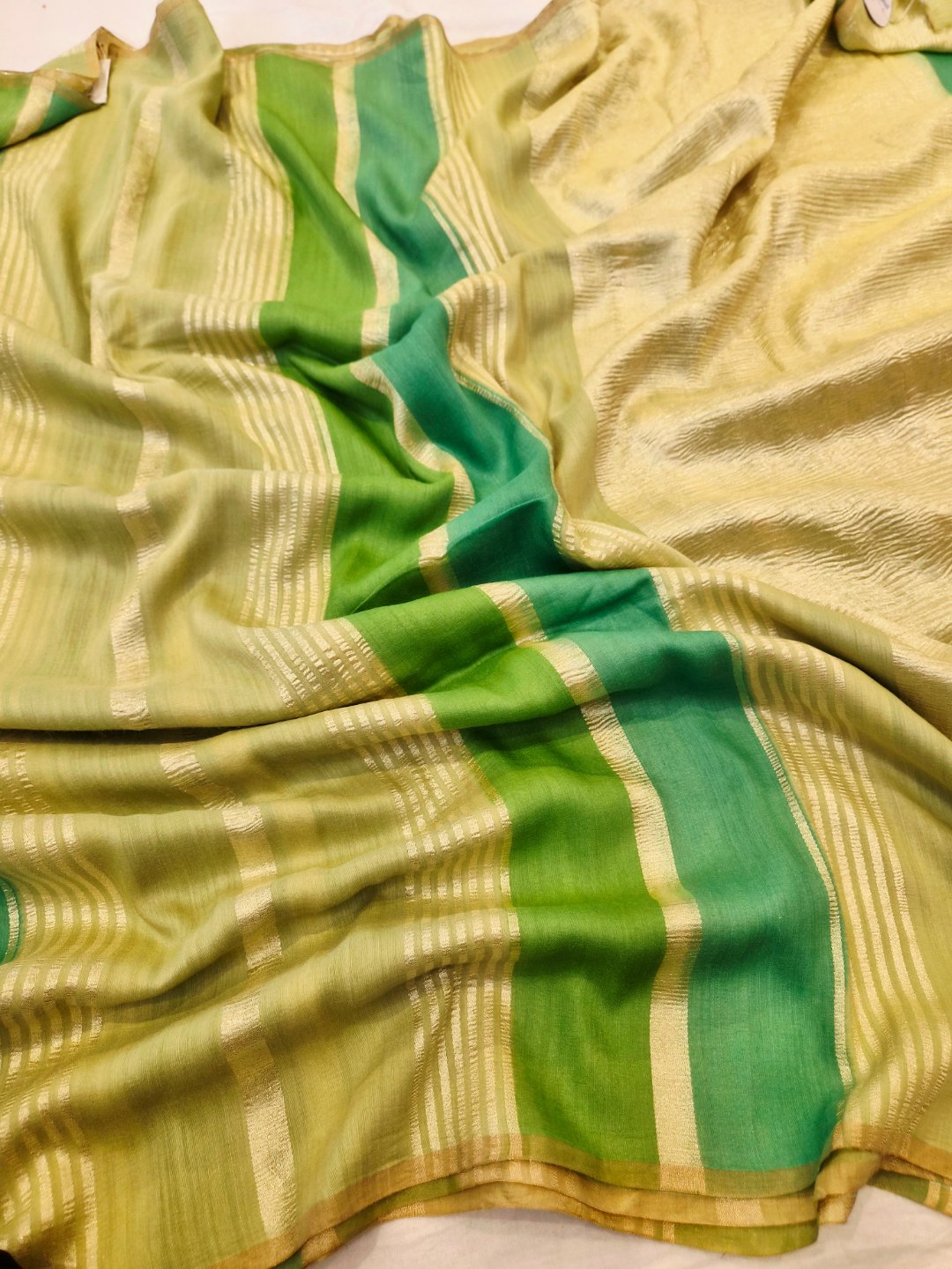 Shades of Green Moonga Silk Banarasi saree front drape view