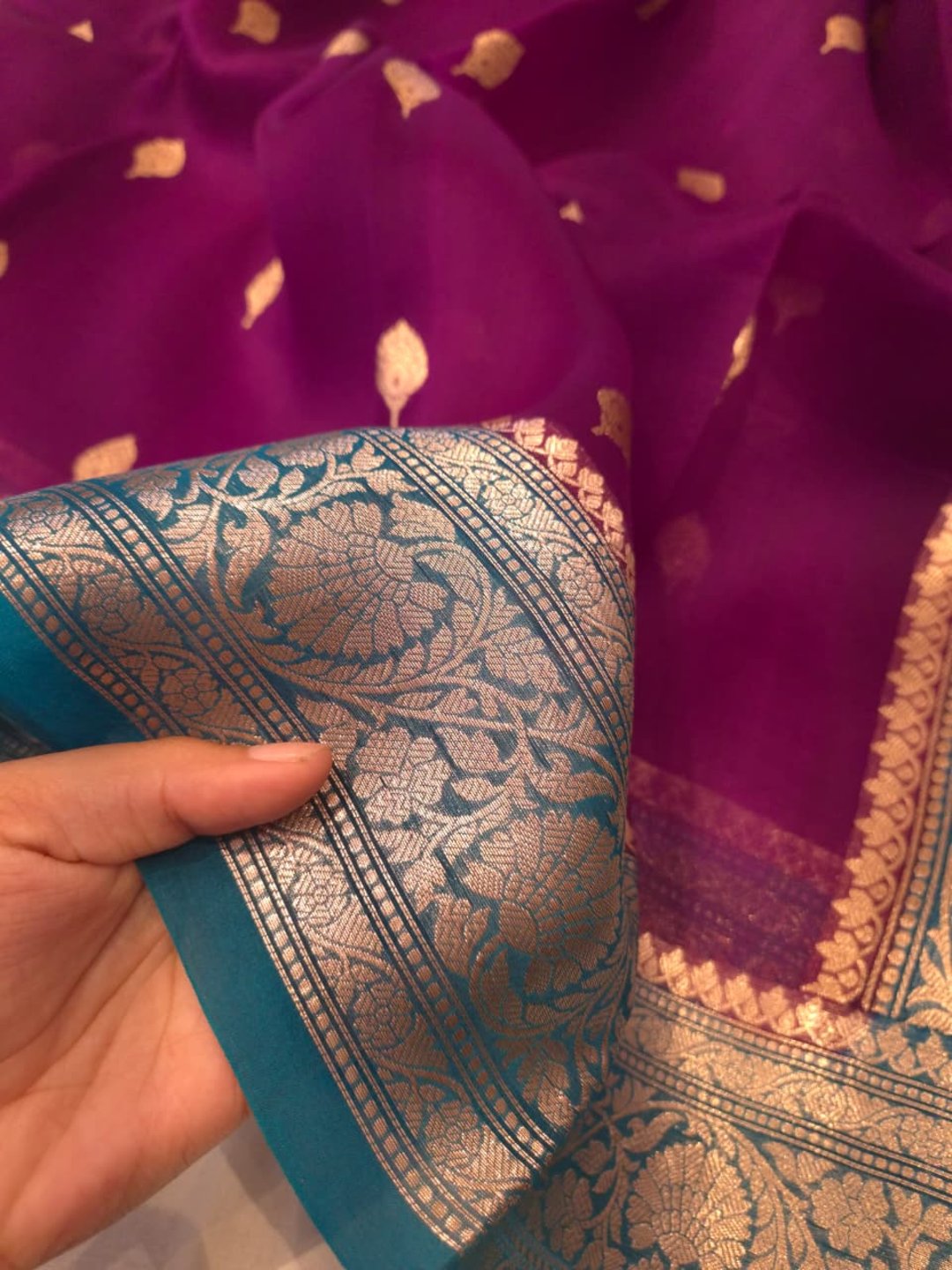 Purple Cora silk Banarasi saree border closeup