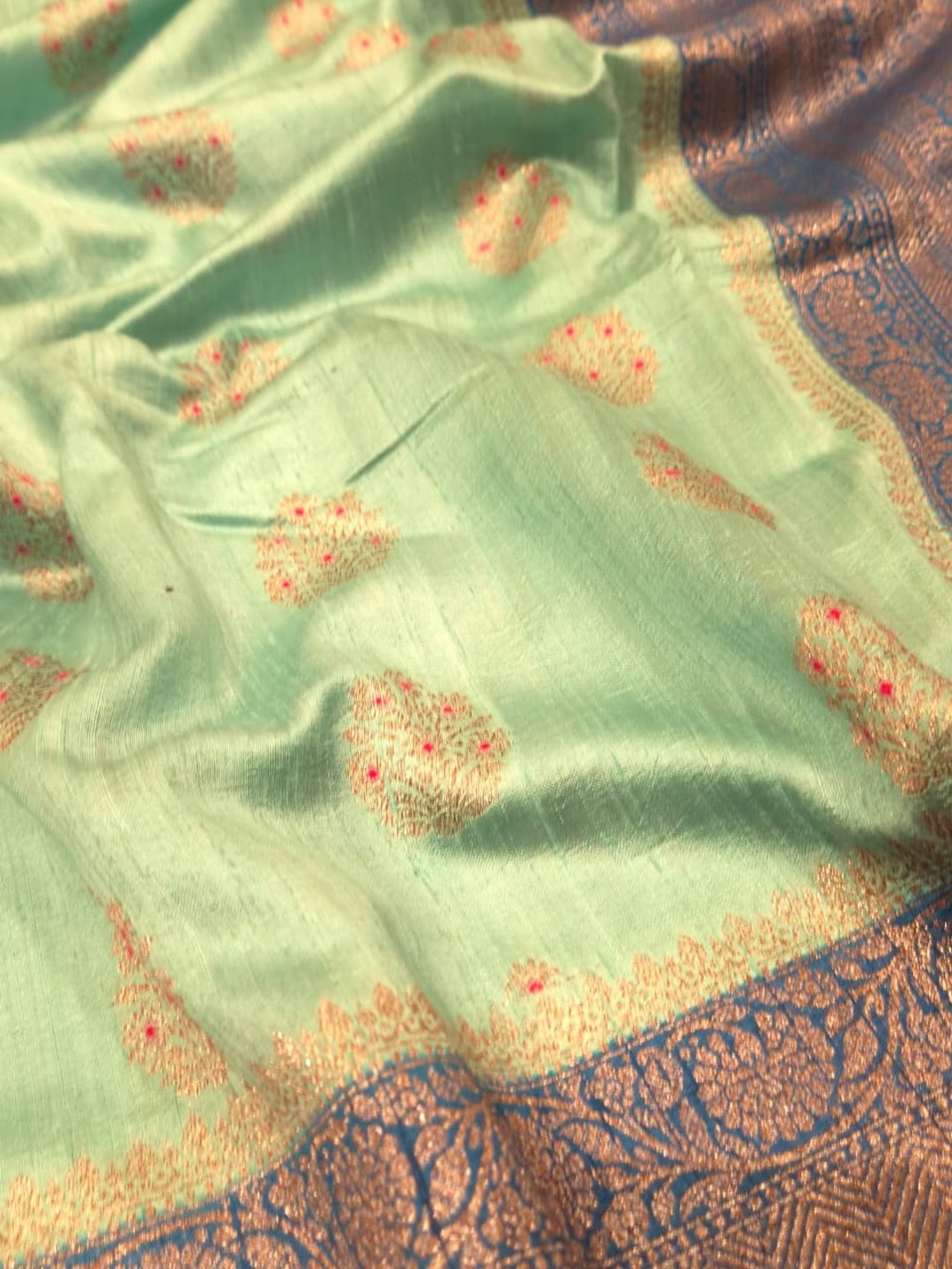 Mint Green Body with Peacock Blue Border Tussar Silk Banarasi saree border closeup