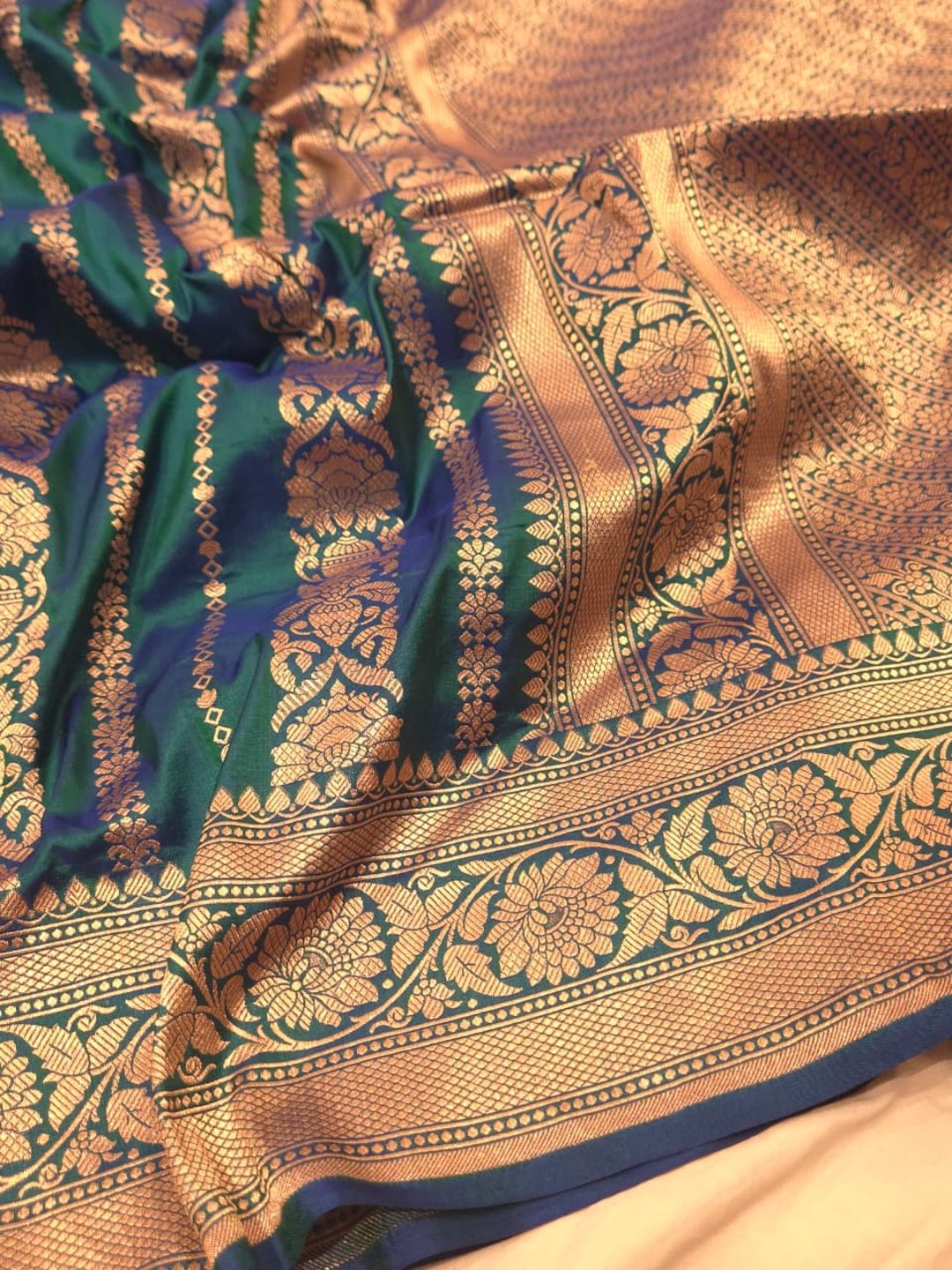 Peacock blue Katan Silk Banarasi saree border closeup