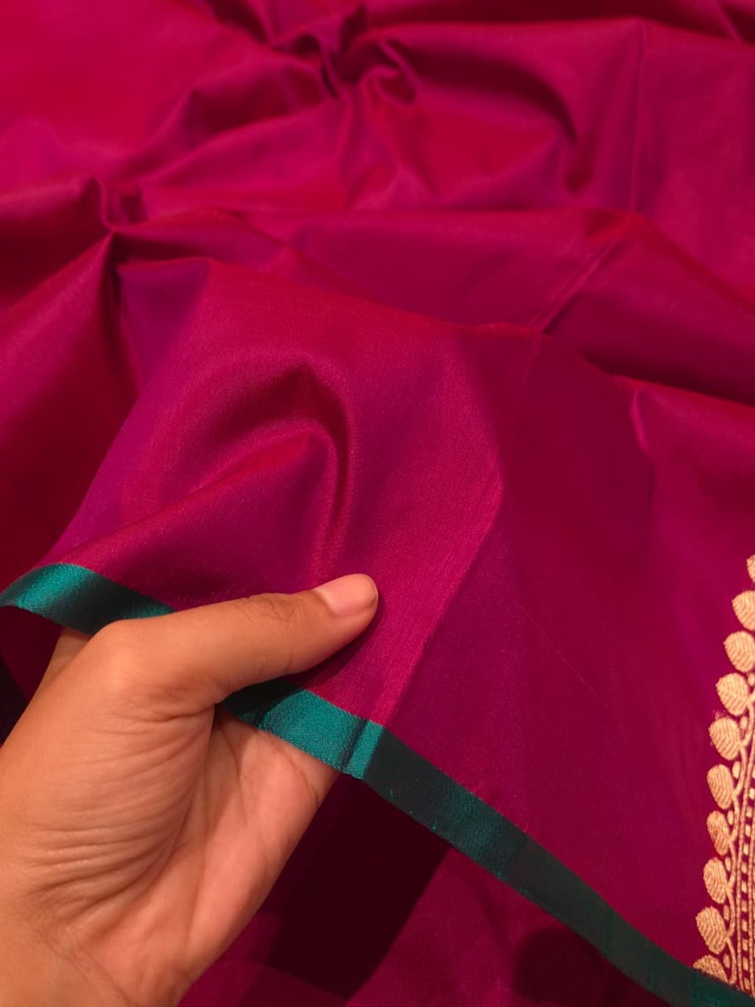 vibrant magenta-pink Katan Silk Banarasi saree border closeup