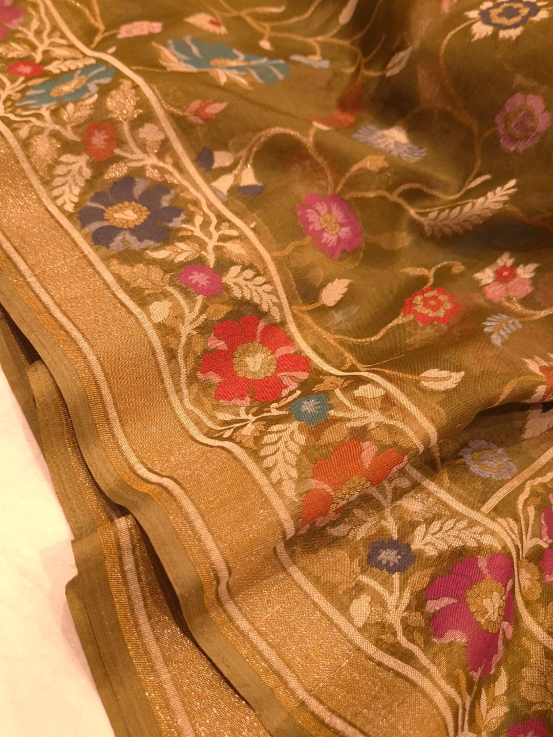 Rich Olive Green with Multicolour Floral Weaving Kora Silk Banarasi saree folded view