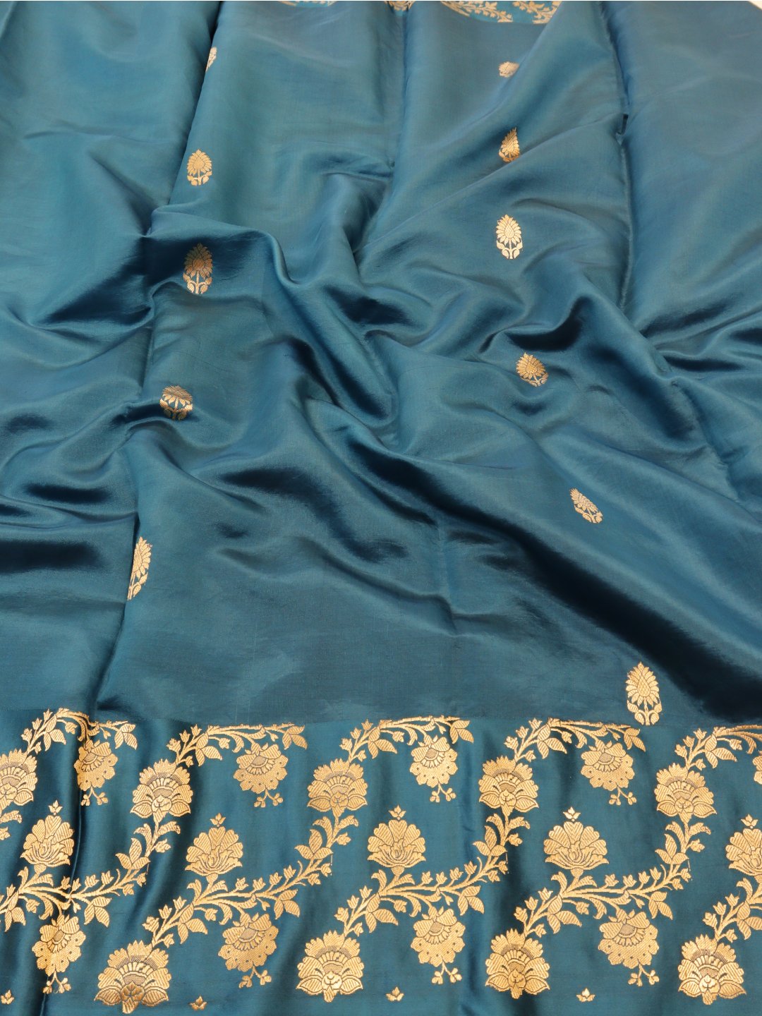 Dark Teal Blue Katan Silk Banarasi saree border closeup