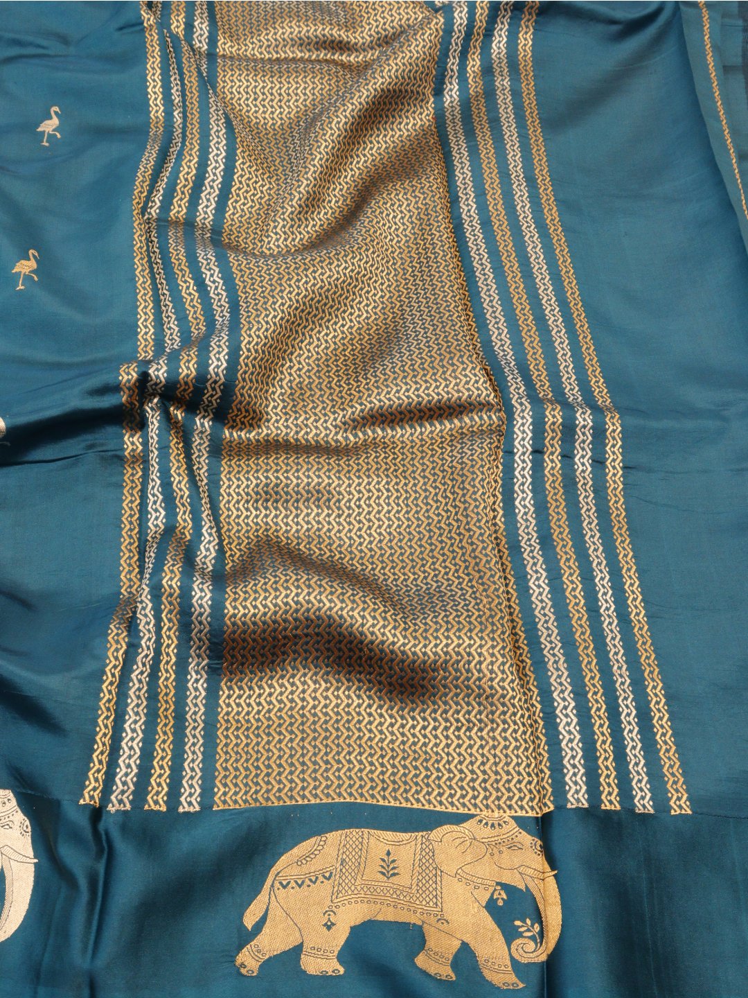 Deep teal blue with gold and silver-toned zari Katan Silk Banarasi saree pallu detail