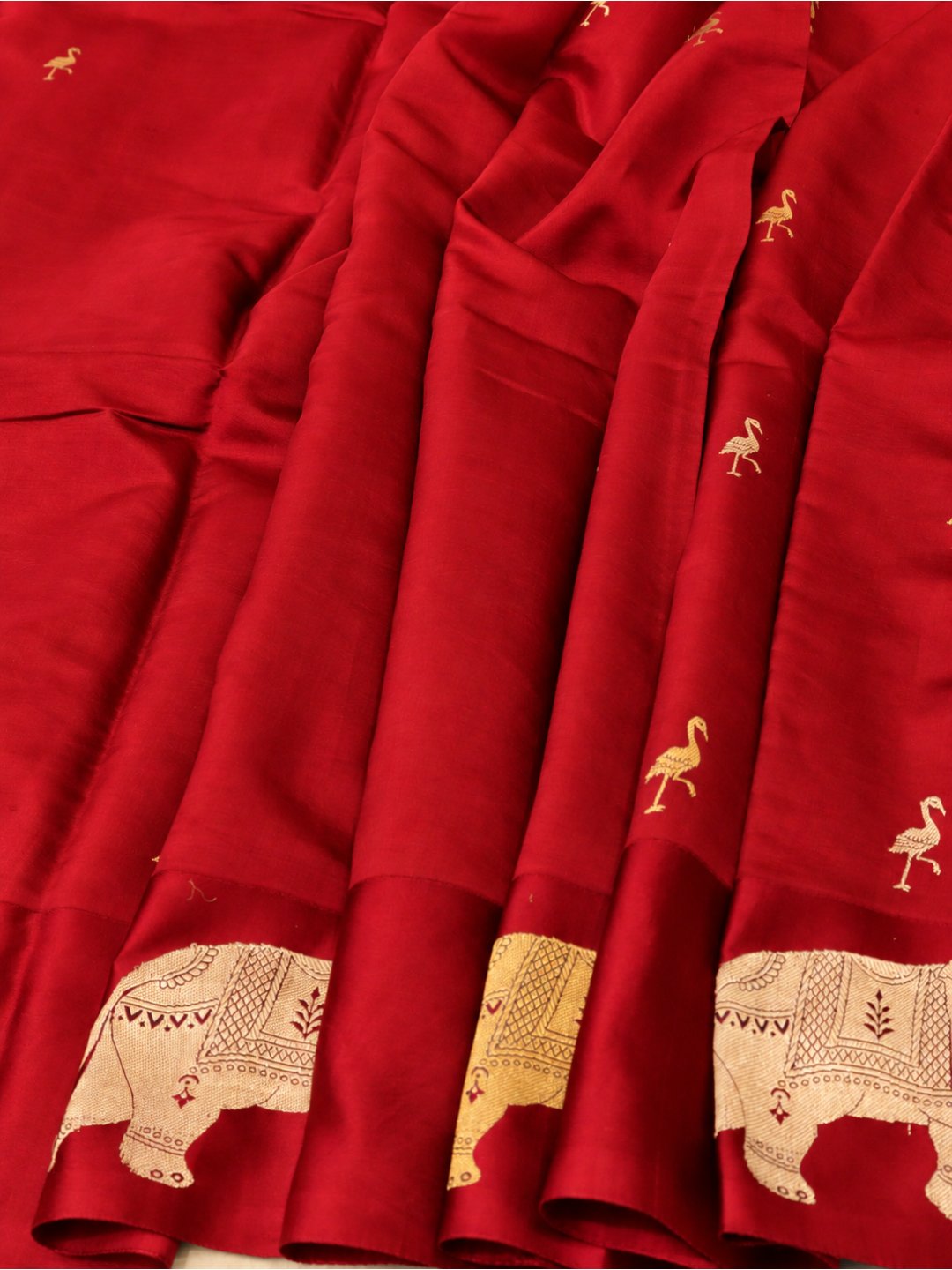 Royal Red with gold and silver-toned zari Katan Silk Banarasi saree border closeup