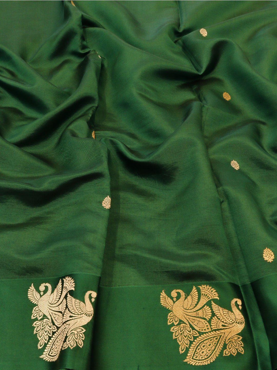 Bottle Green with gold and silver-toned zari Katan Silk Banarasi saree border closeup