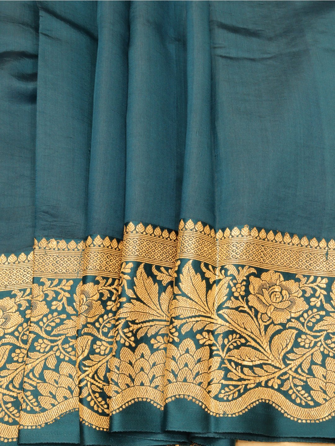 Dark Teal Blue Katan Silk Banarasi saree border closeup