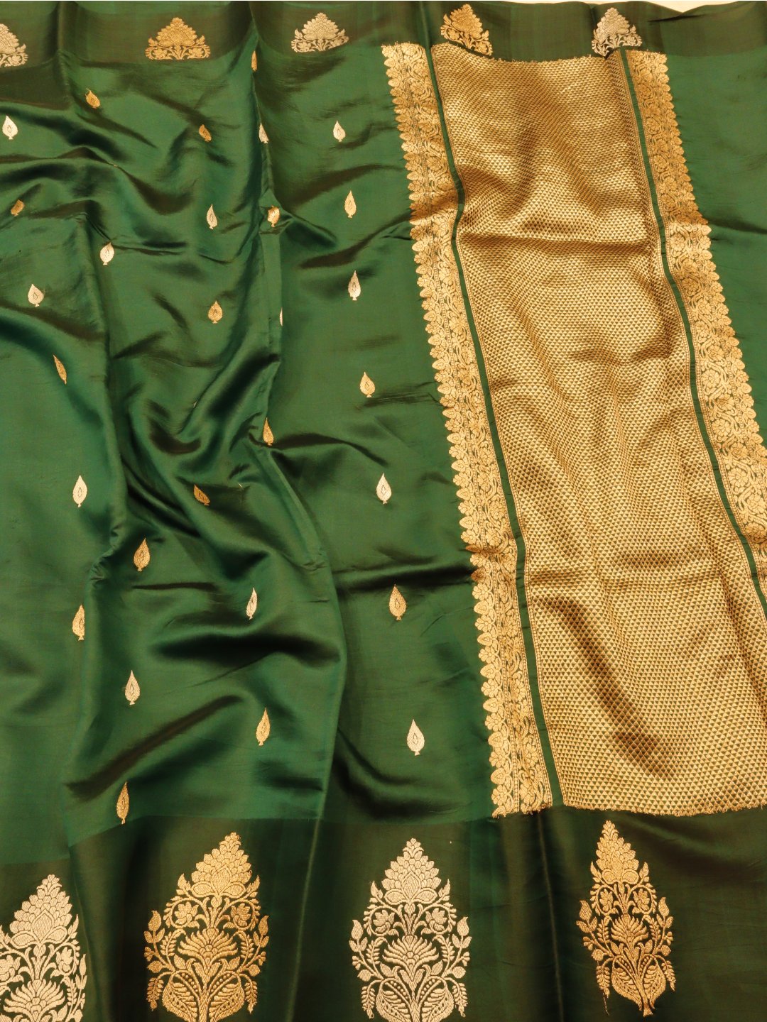 Bottle Green Katan Silk Banarasi saree front drape view