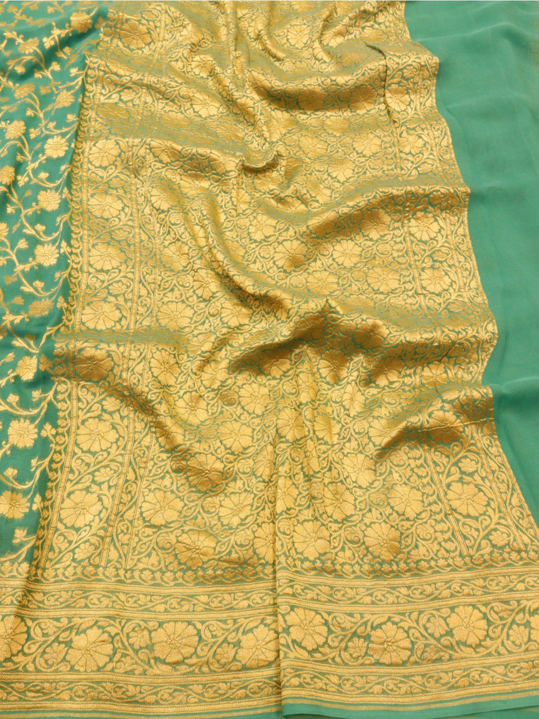 Sea Green with silver zari detailing Khaddi Georgette Banarasi saree pallu detail
