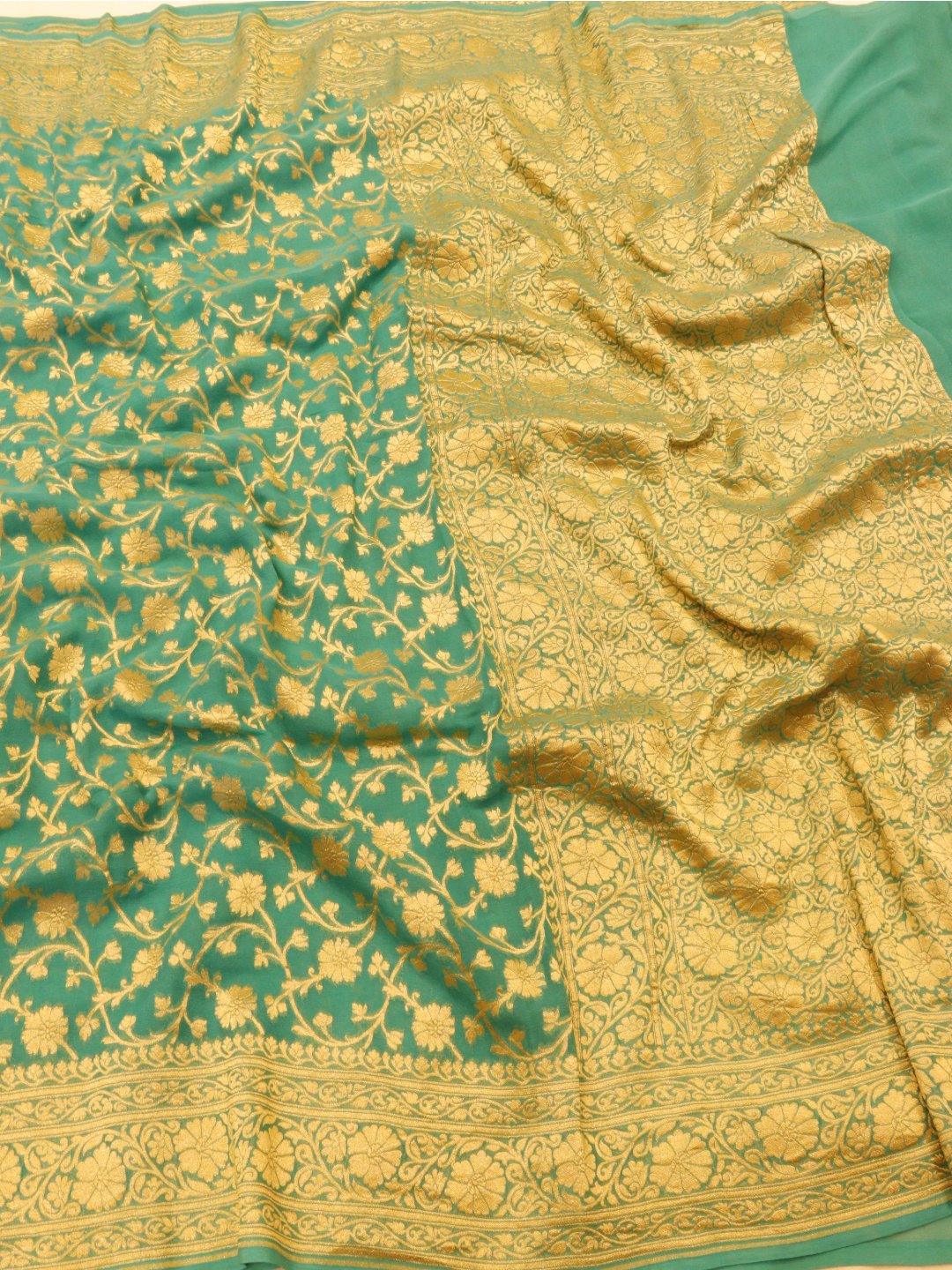 Sea Green with silver zari detailing Khaddi Georgette Banarasi saree front drape view