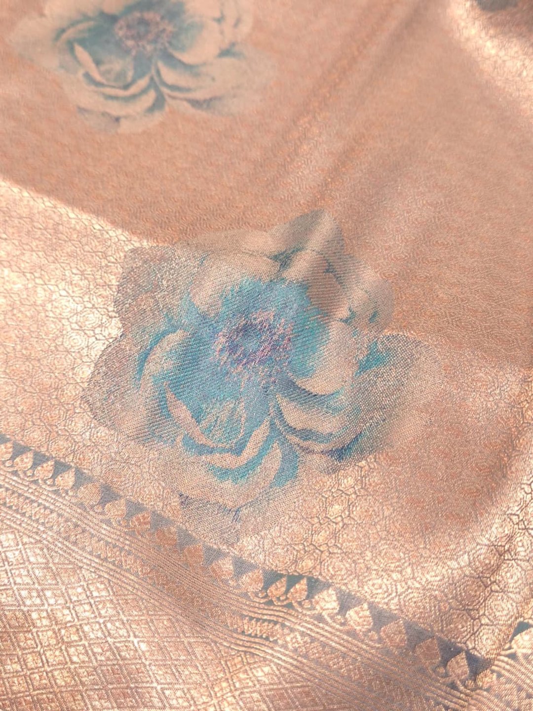 Silver body with sky blue floral motifs Mulbari silk Banarasi saree full spread