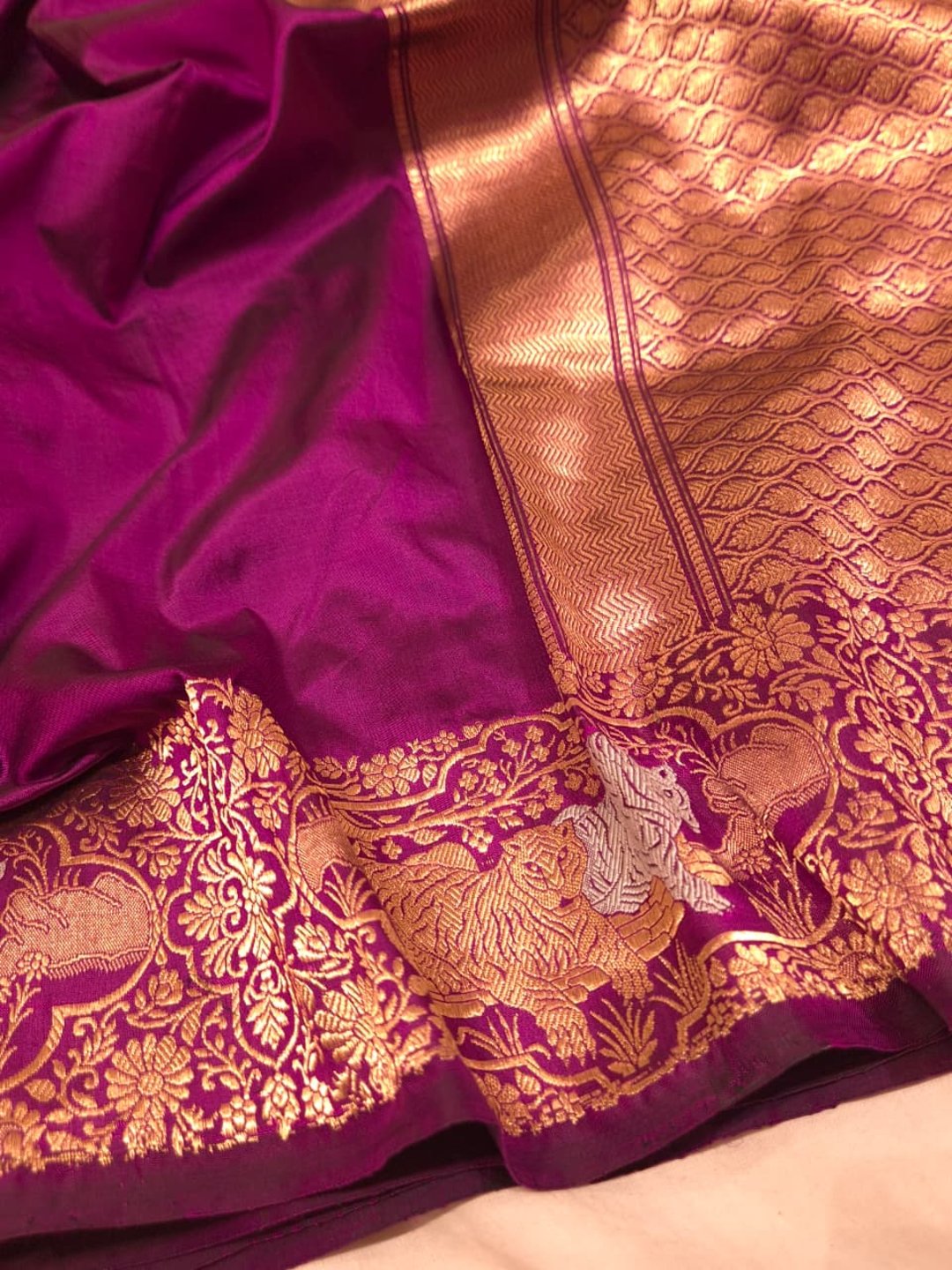 Magenta Pink with gold-toned weaving Katan Silk Banarasi saree pallu detail