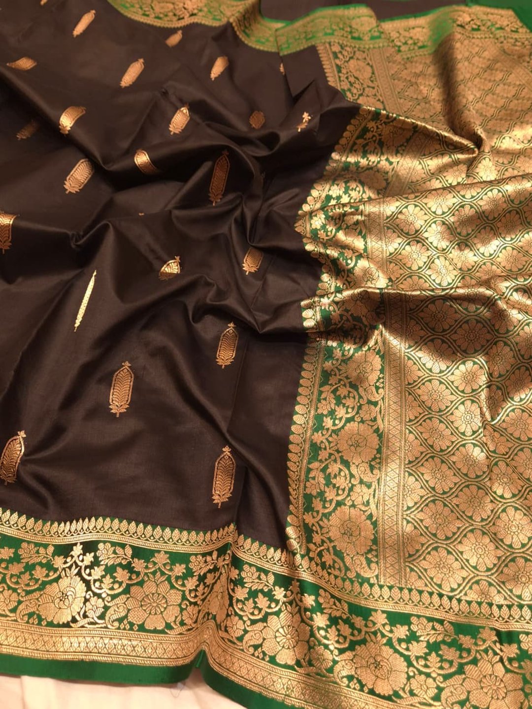 Black with green contrast border Katan Silk Banarasi saree front drape view
