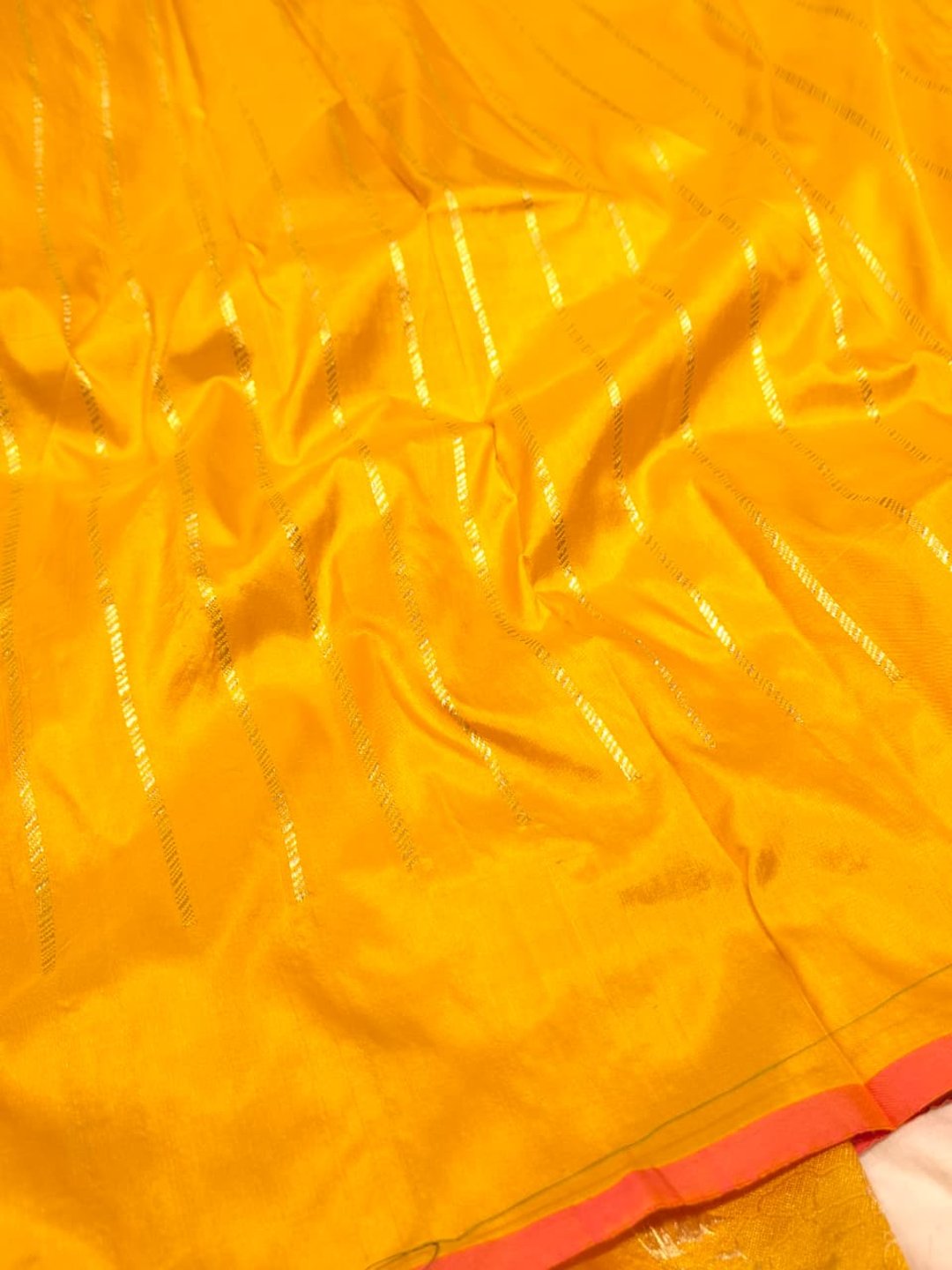 Yellow with Golden bird pattern border Katan Silk Banarasi saree texture detail