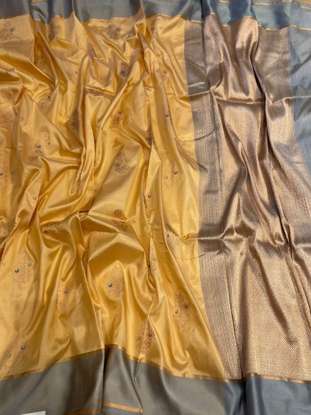 Light yellow with grey patta border Satin Silk Banarasi saree front drape view