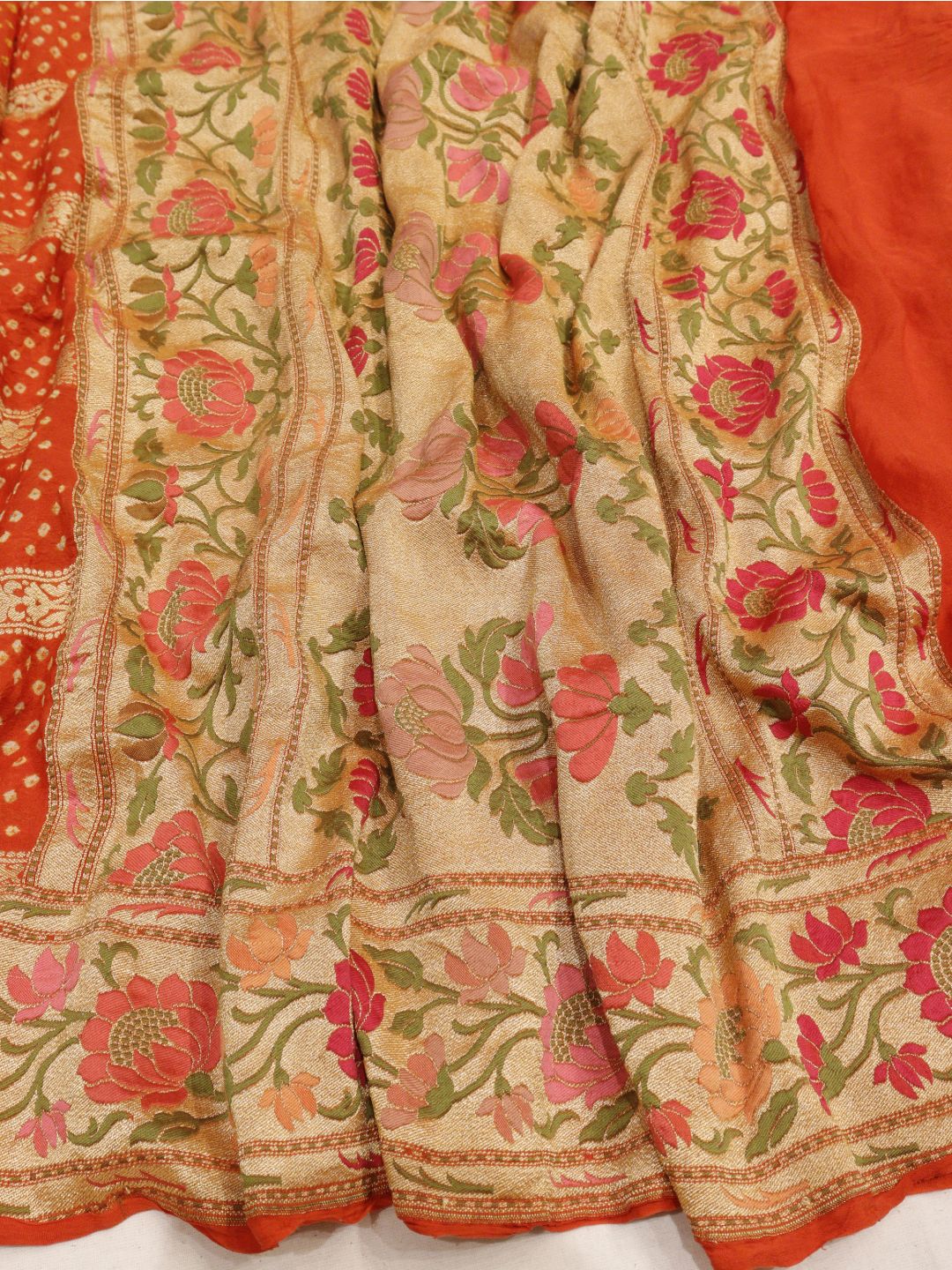 Orange Bandhani Banarasi saree border closeup