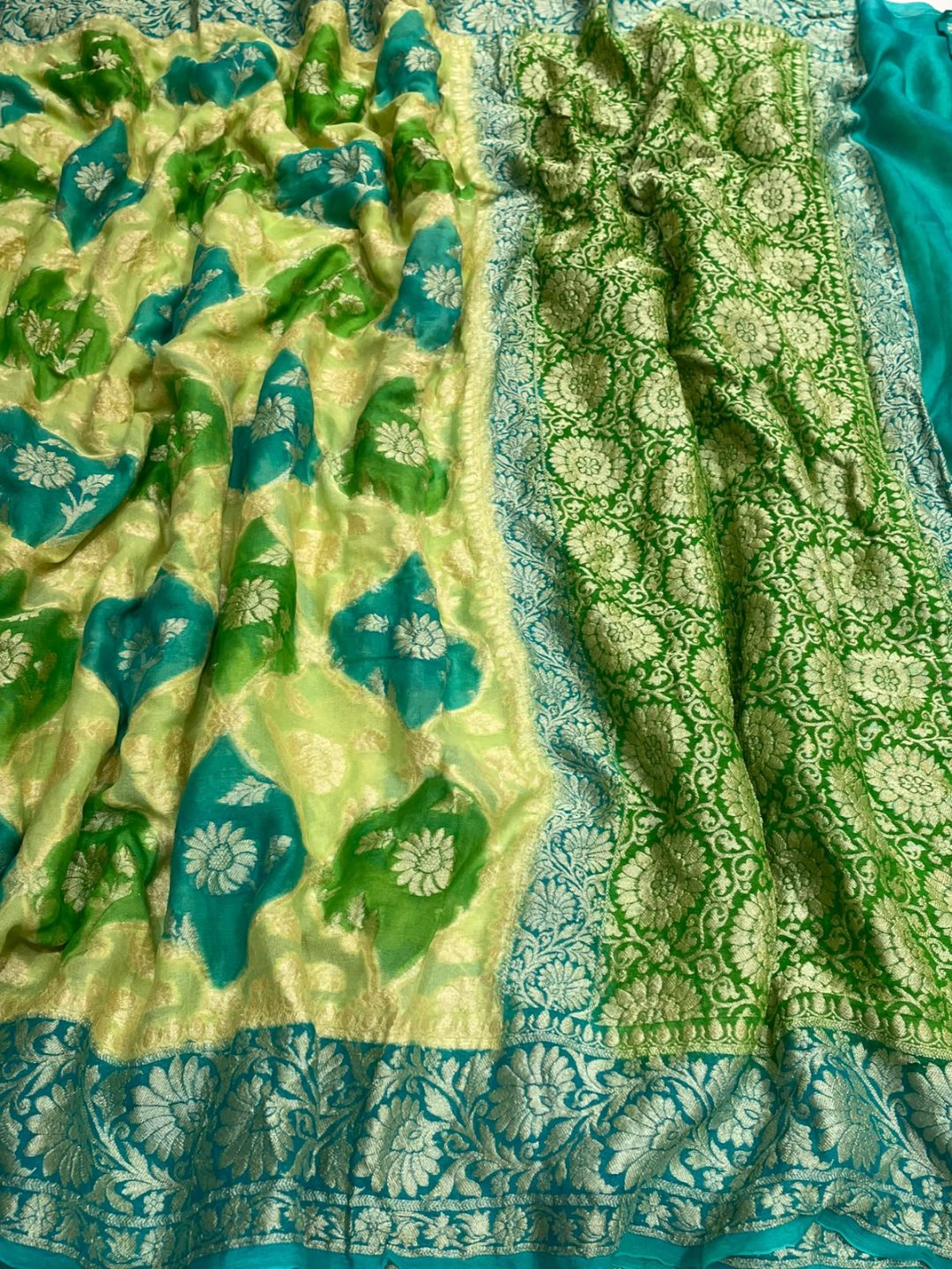 vibrant mix of light green and aqua blue. Chiffon Banarasi saree front drape view