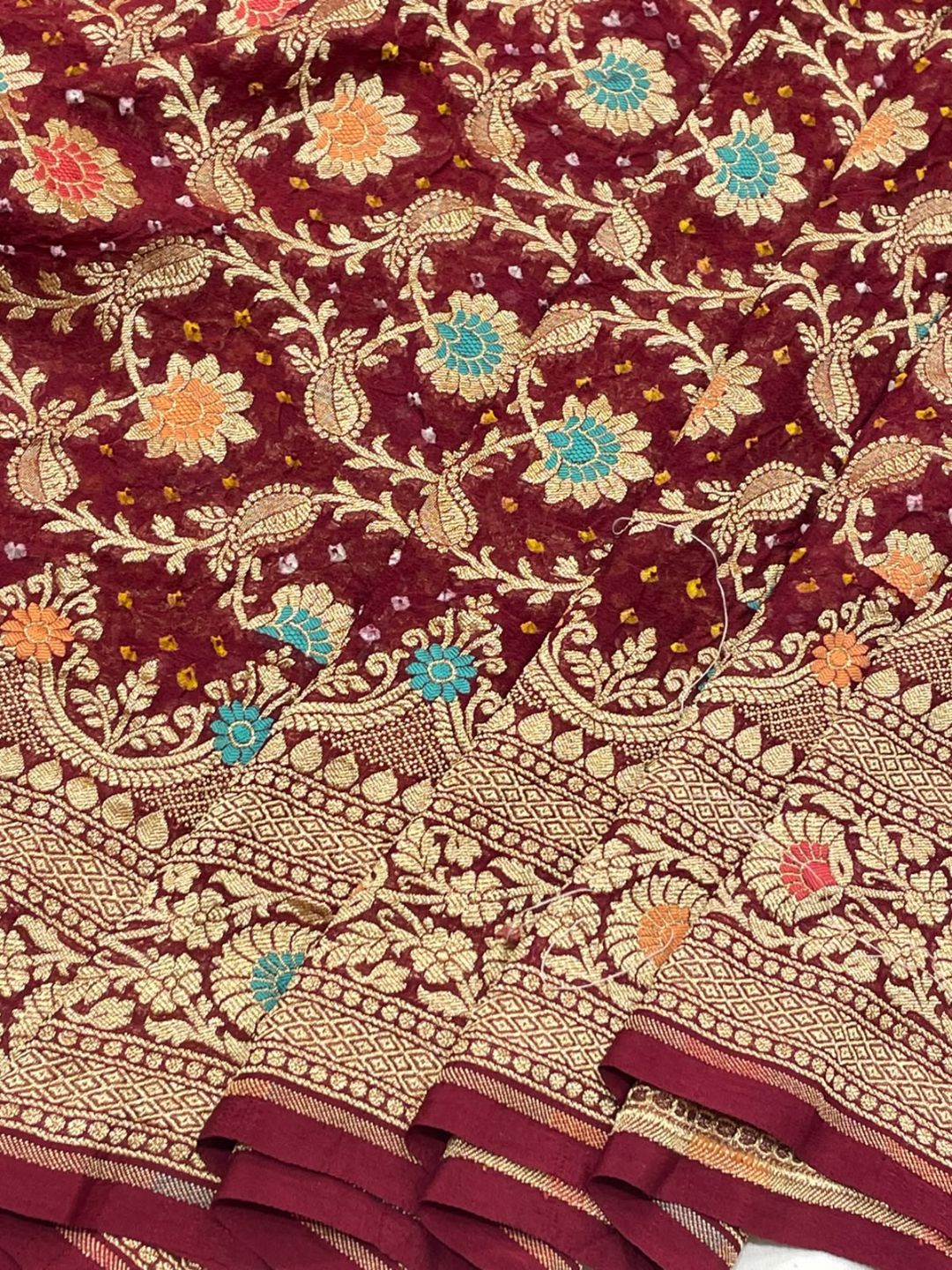 Dark Maroon with Golden floral work Bandhani Banarasi saree border closeup