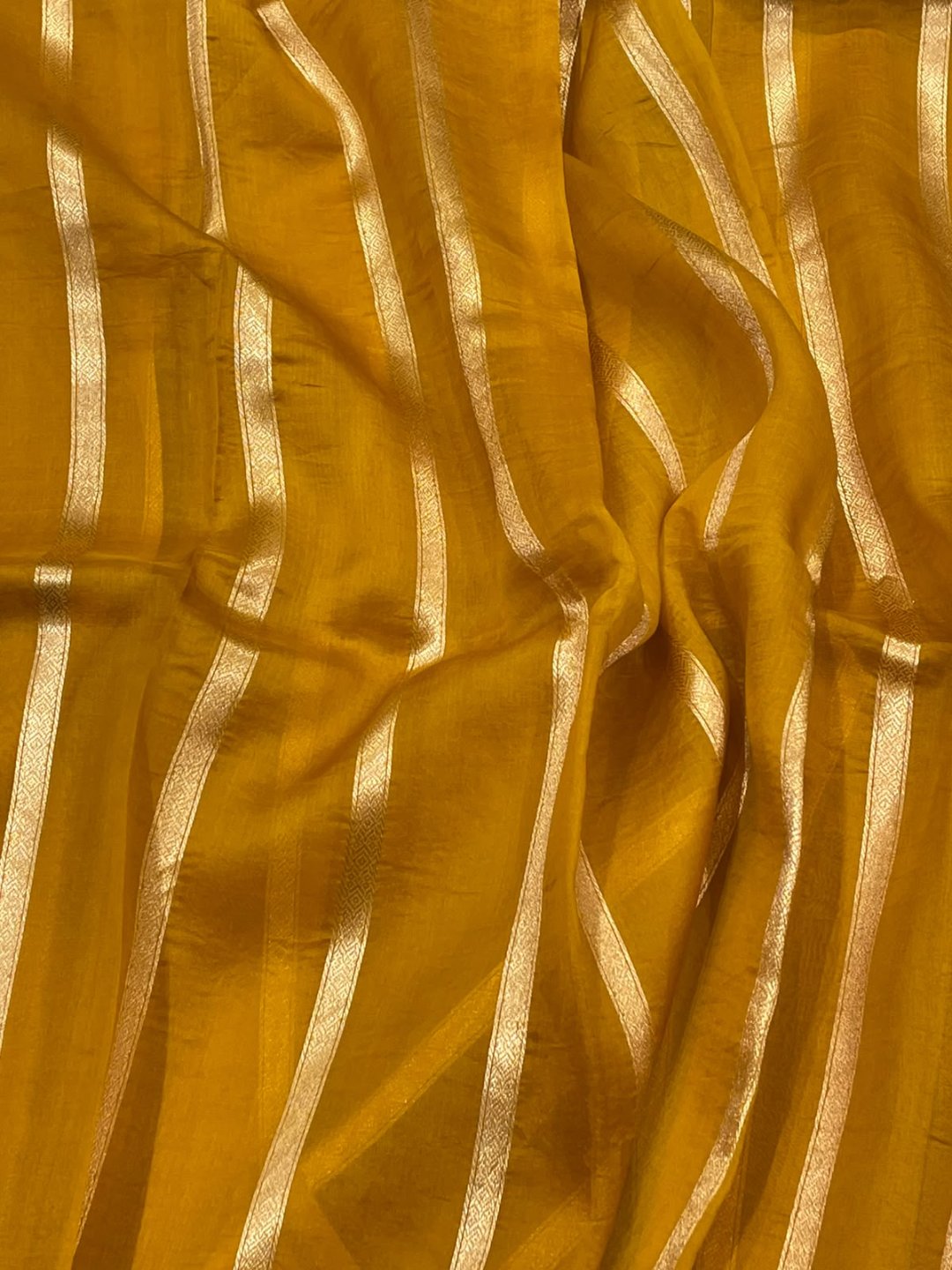 Musturd yellow Kora Silk Banarasi saree border closeup